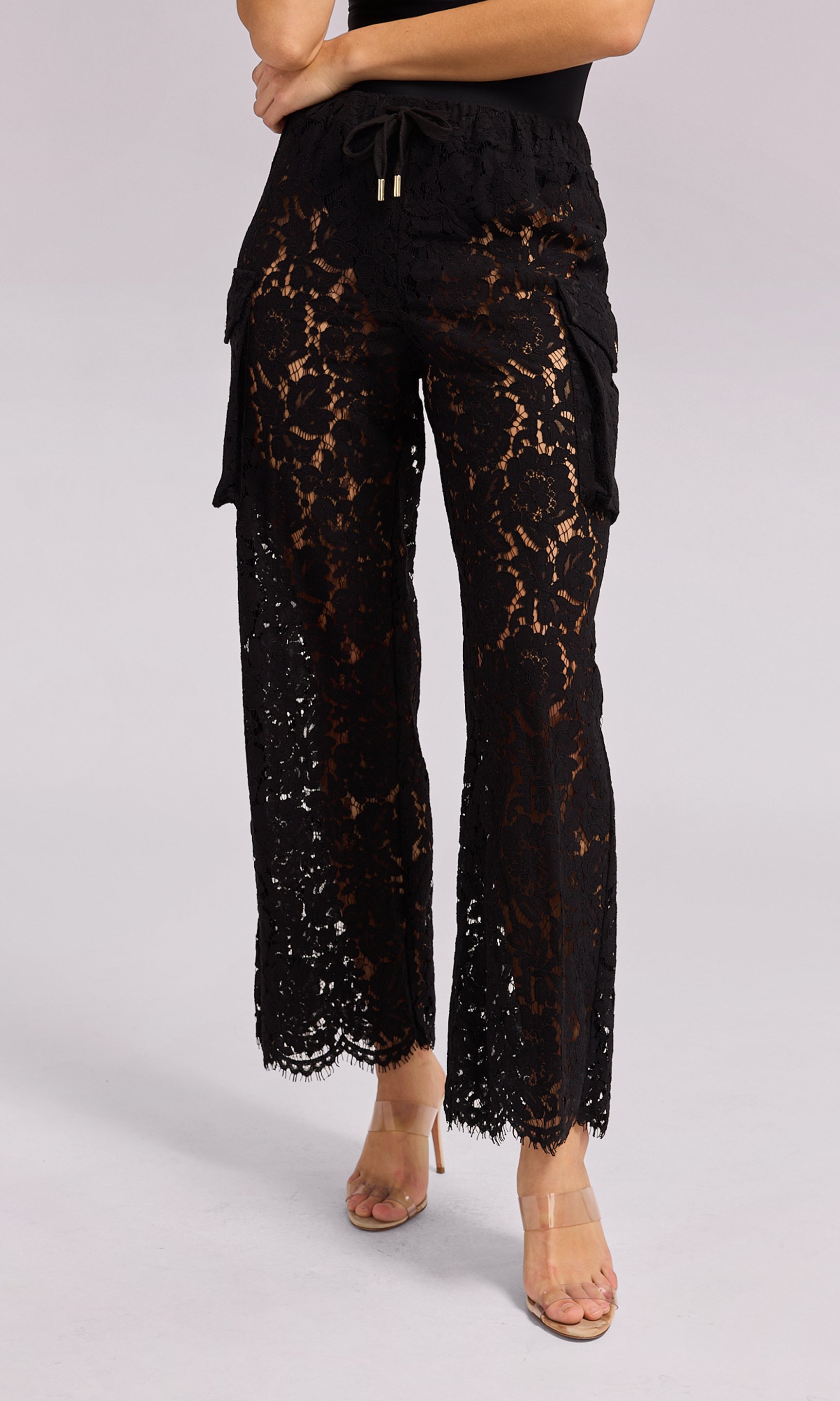 Palmer Lace Cargo Pant in black lace, showcasing a fashionable and eye-catching style for any outfit.