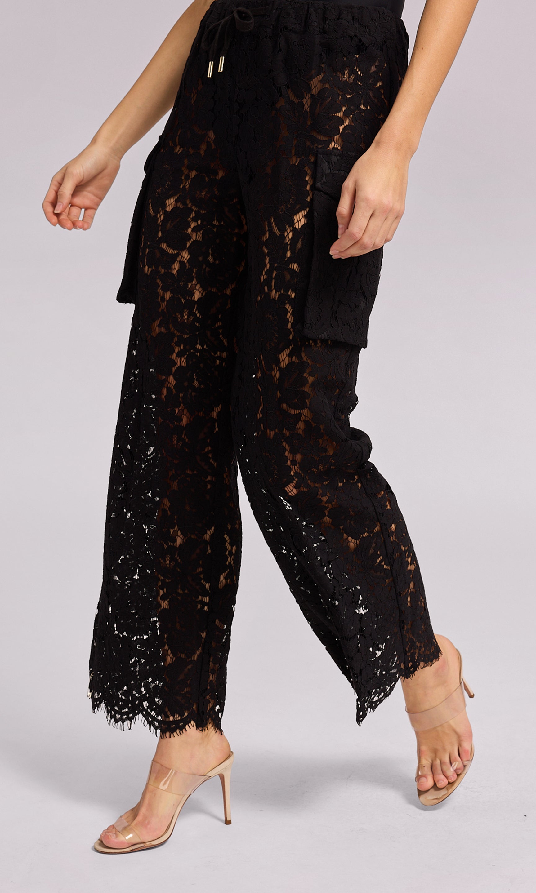 Palmer Lace Cargo Pant in black lace, showcasing a fashionable and eye-catching style for any outfit.