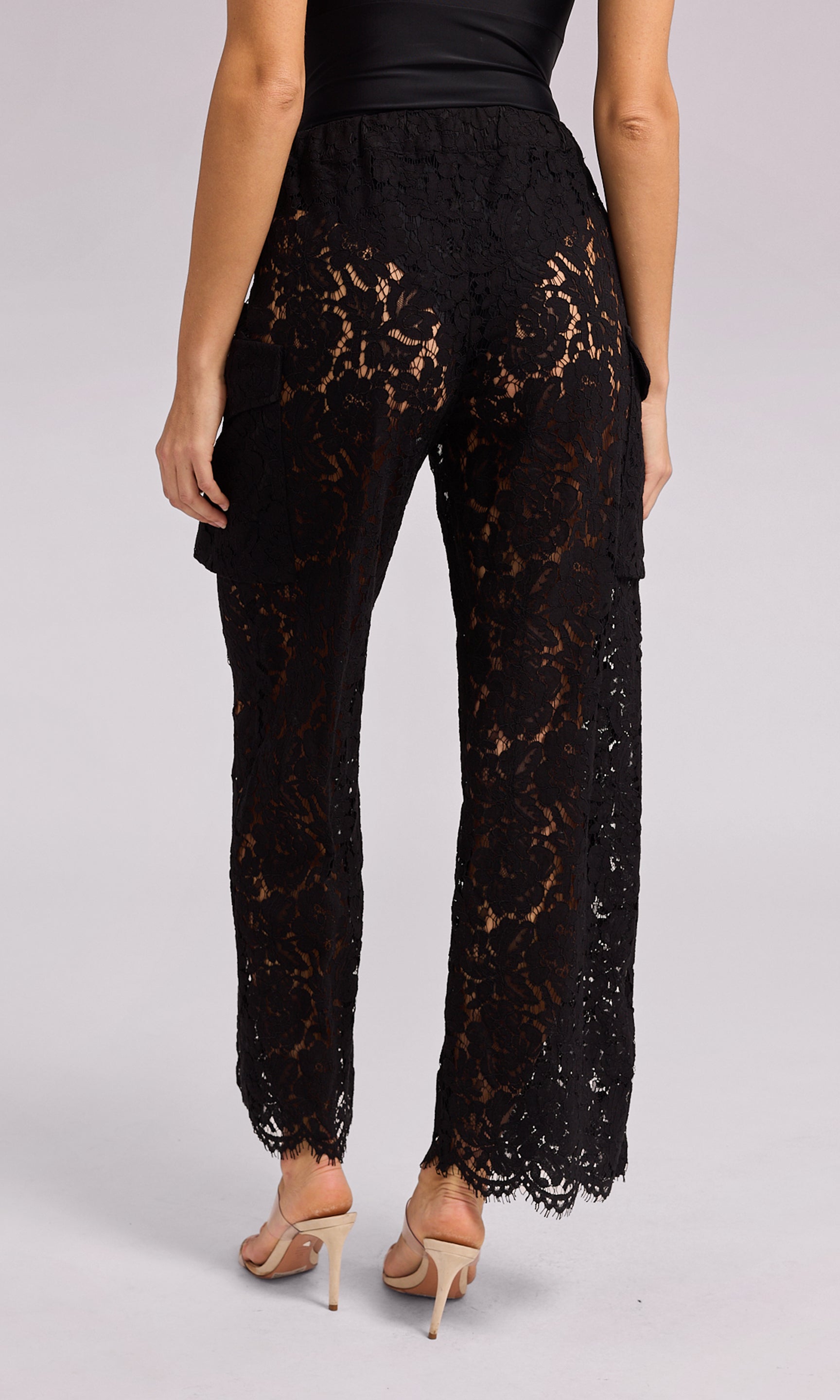 Palmer Lace Cargo Pant in black lace, showcasing a fashionable and eye-catching style for any outfit.