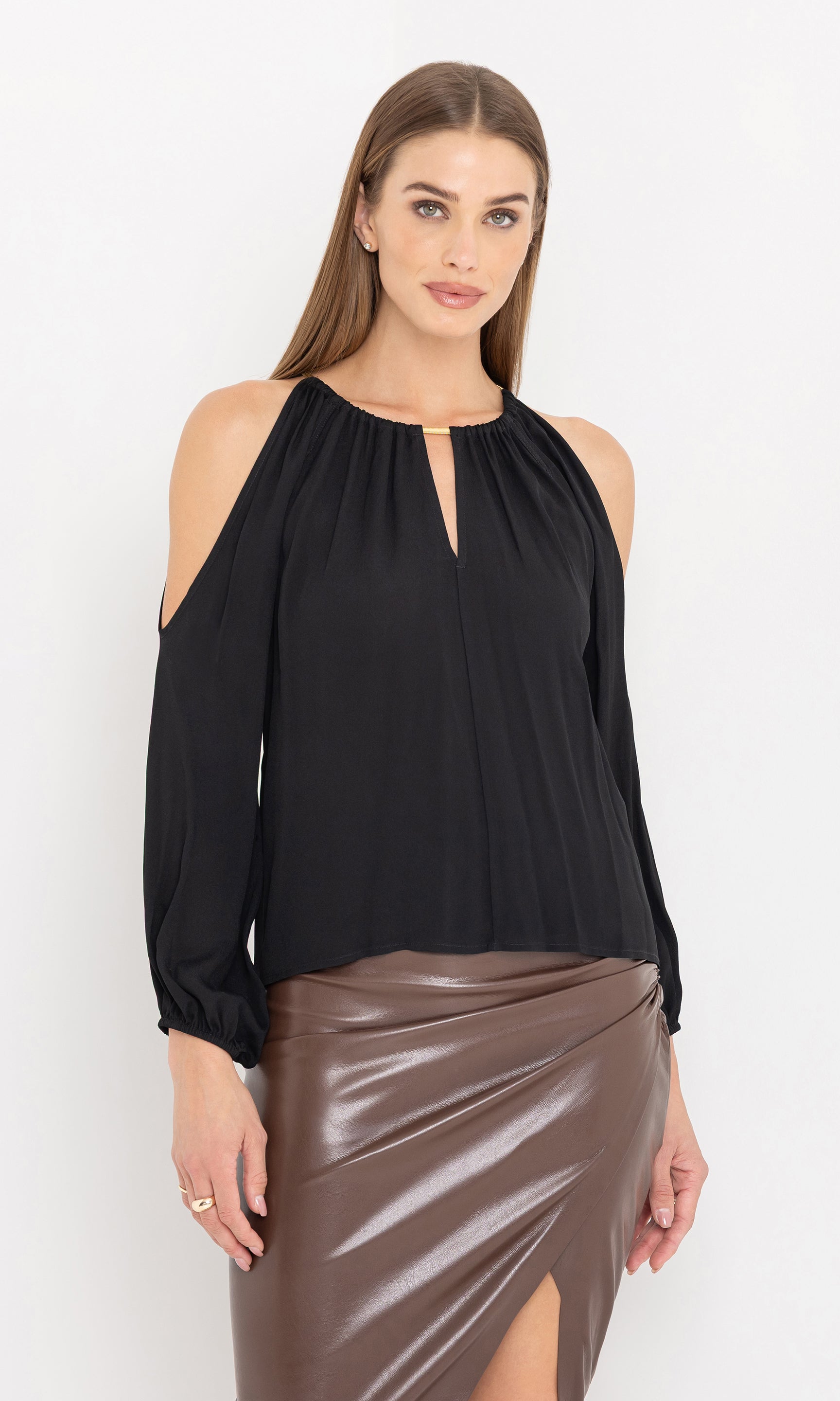 Front view of the model wearing the adara blouse with cold-shoulder design.
