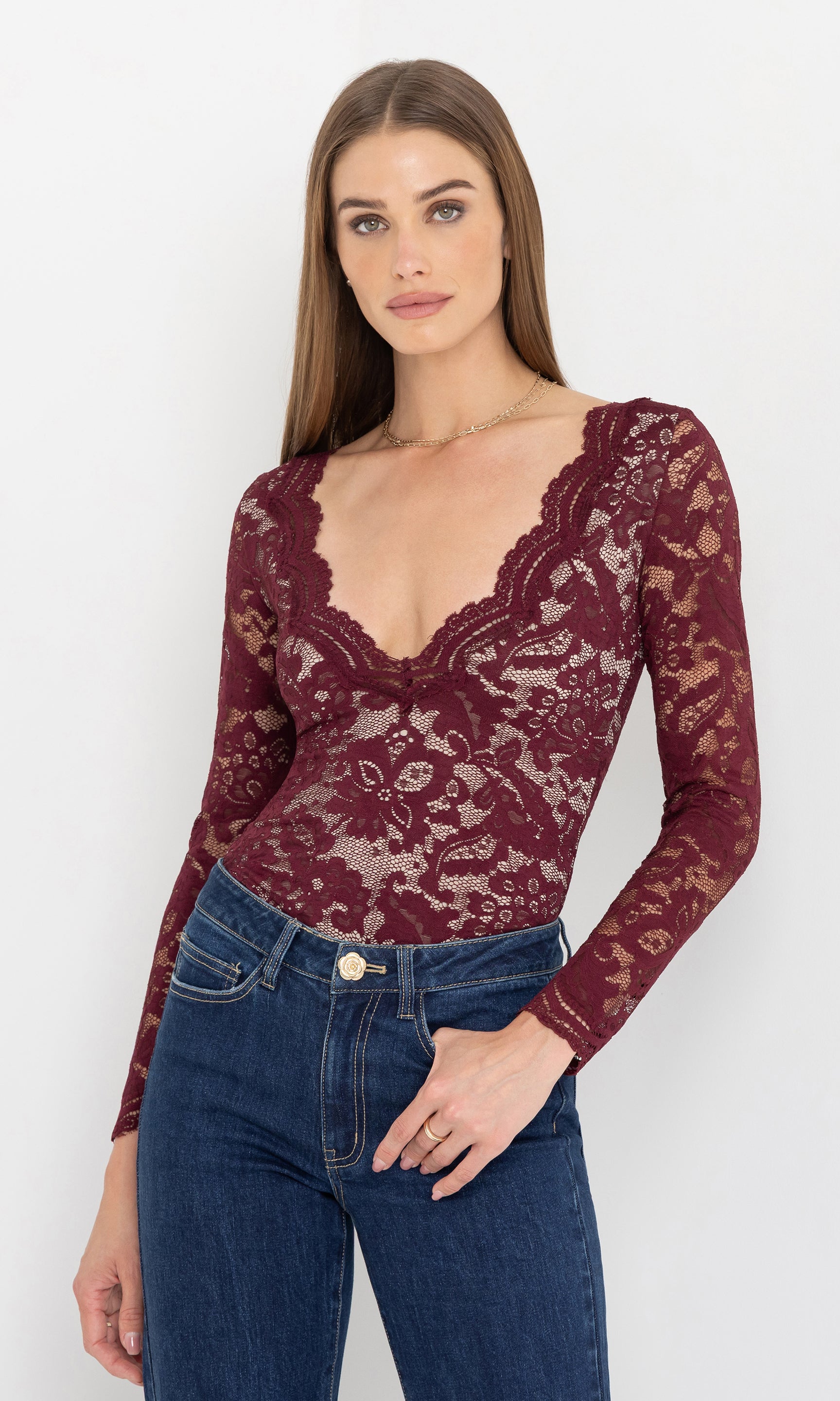 Three-quarter front view of the alessia lace bodysuit emphasizing the slim fit.