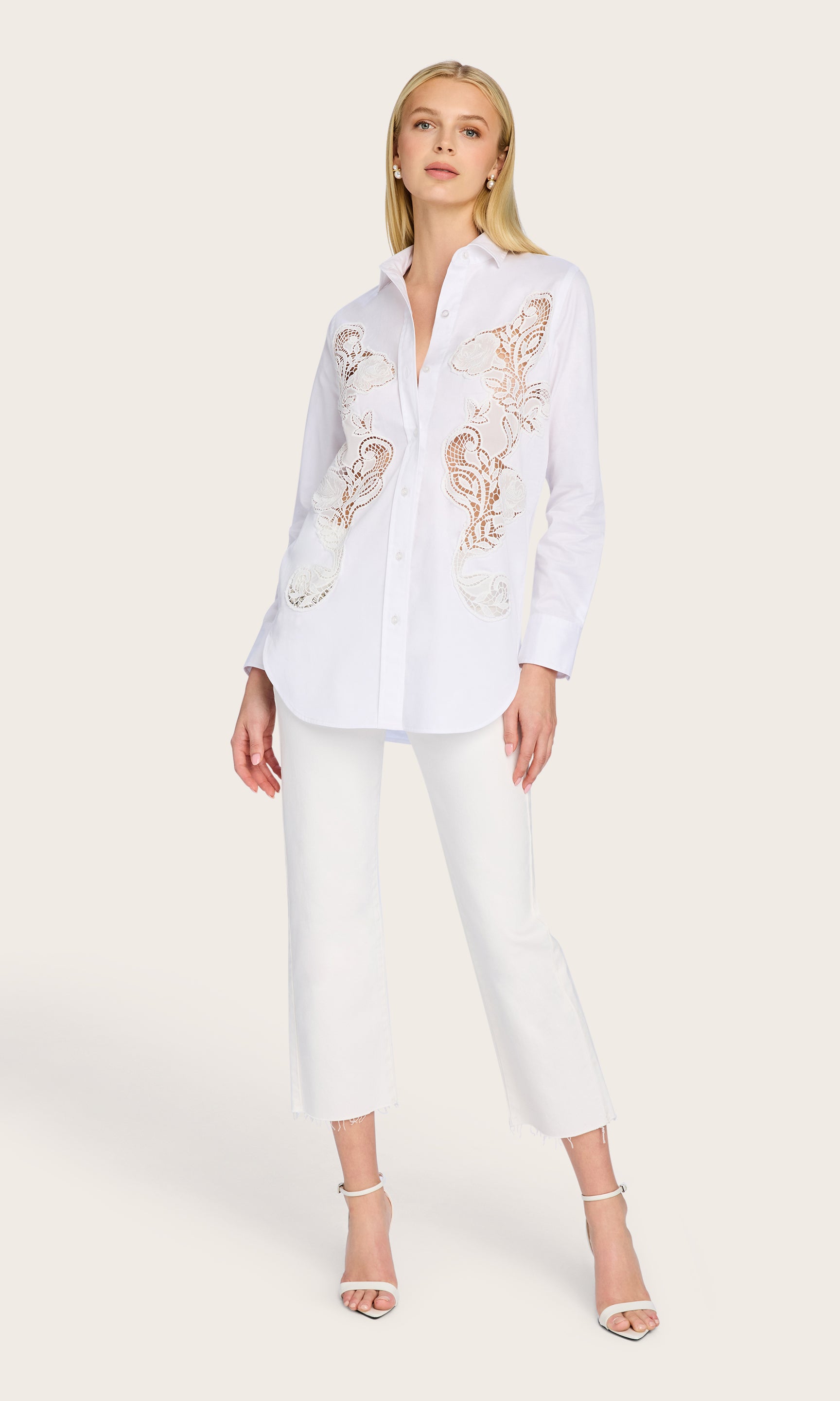 The model styles the Bruno Emb Poplin Shirt in a full body shot, pairing it with jeans for a breezy, effortless look.