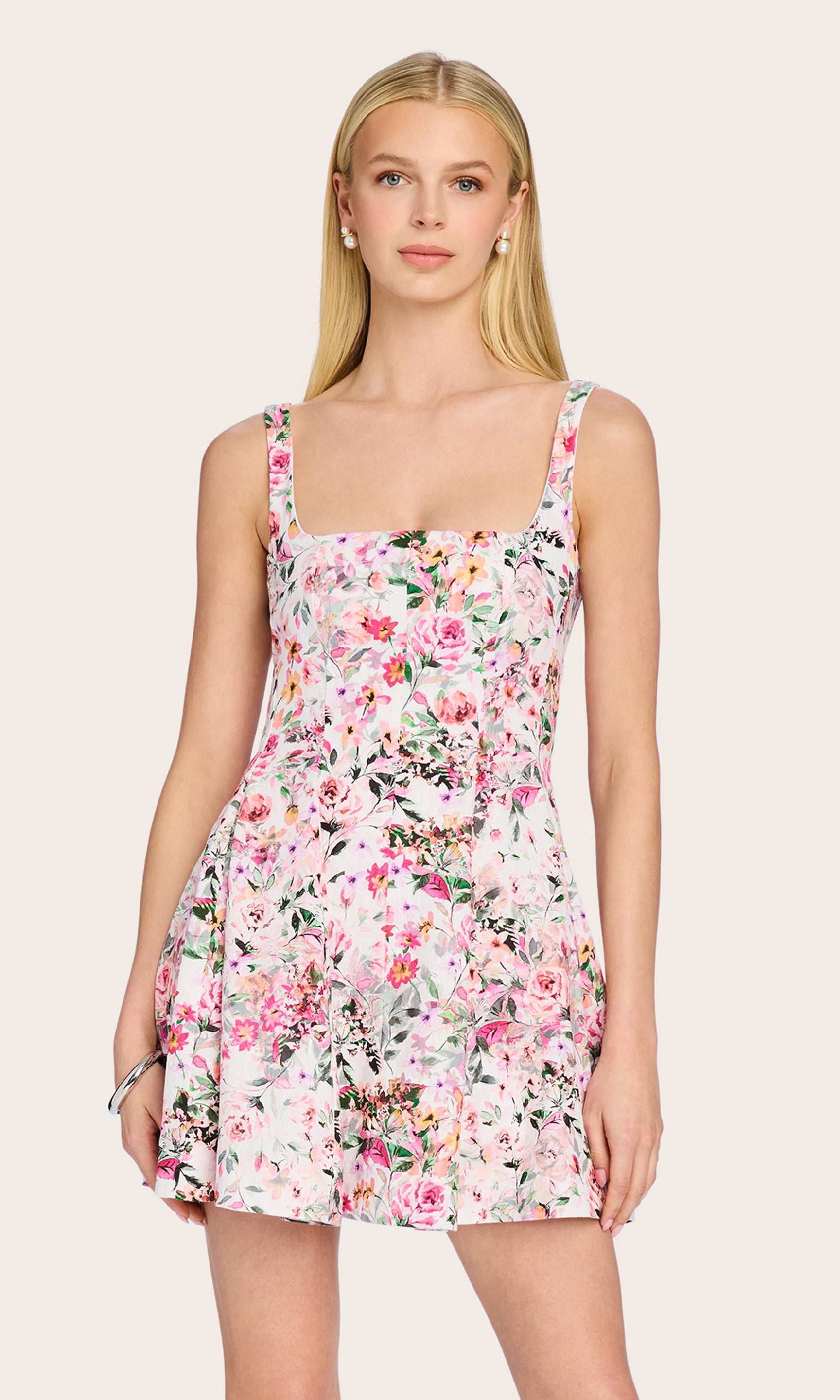 Front view showcasing the square neckline and flared mini silhouette of the Courtney Floral Linen Dress