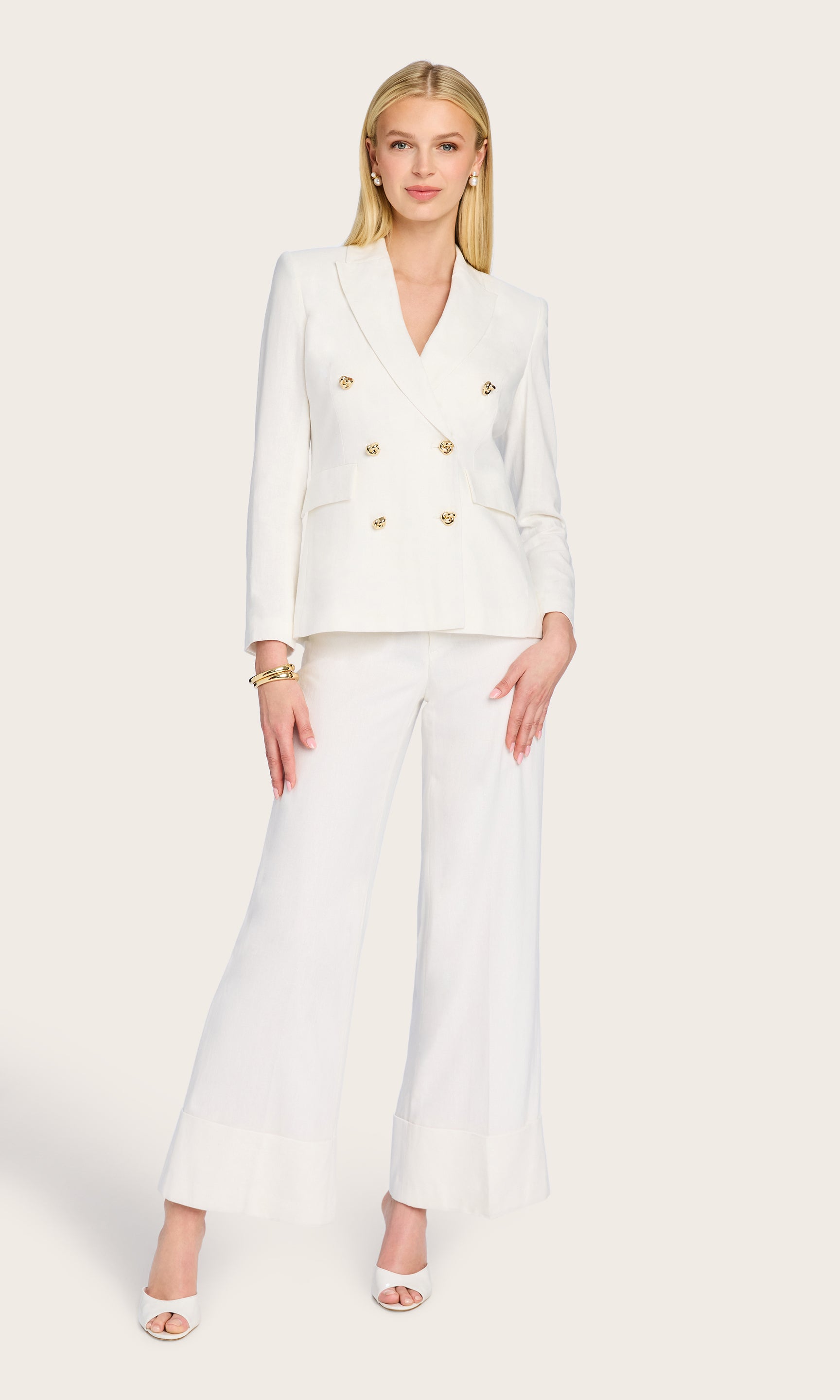 Full body view of the Arielle Linen Blazer paired with wide-leg pants, offering a modern take on power dressing.