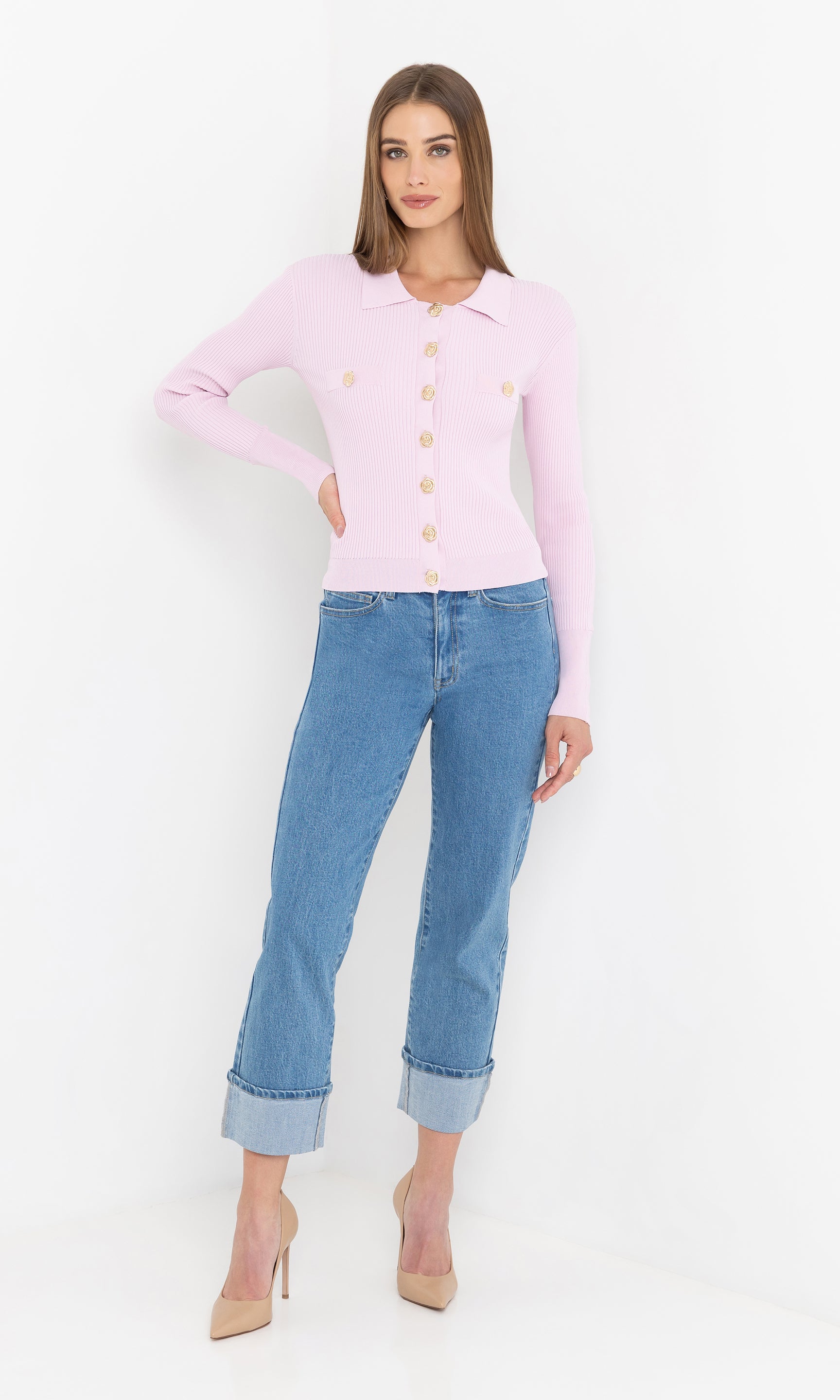 Full body front view of the Carter Rib Cardigan in light pink, styled with blue jeans and heels.