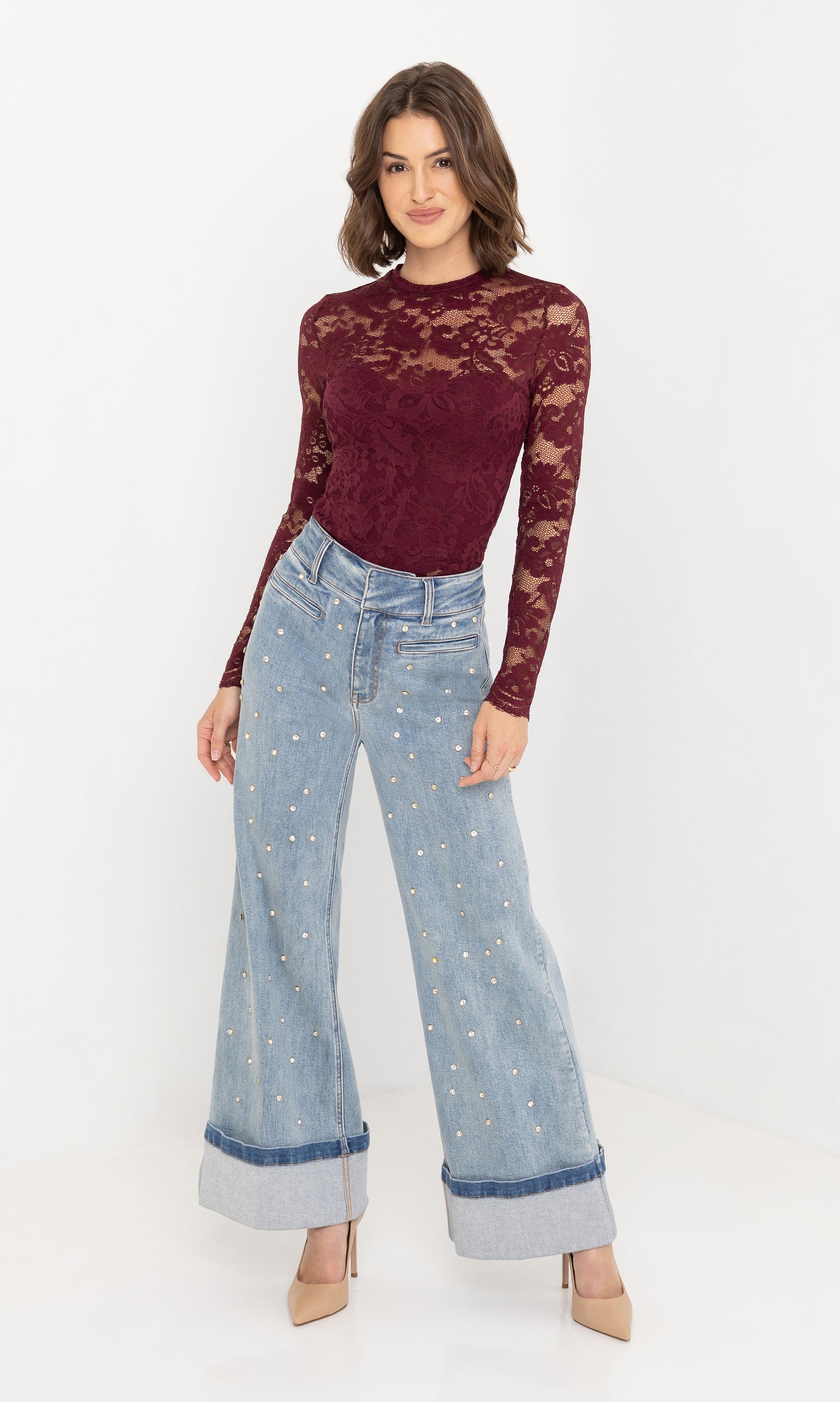Full body front view of the Clayton Lace Top in burgundy, paired with light blue wide-leg jeans.