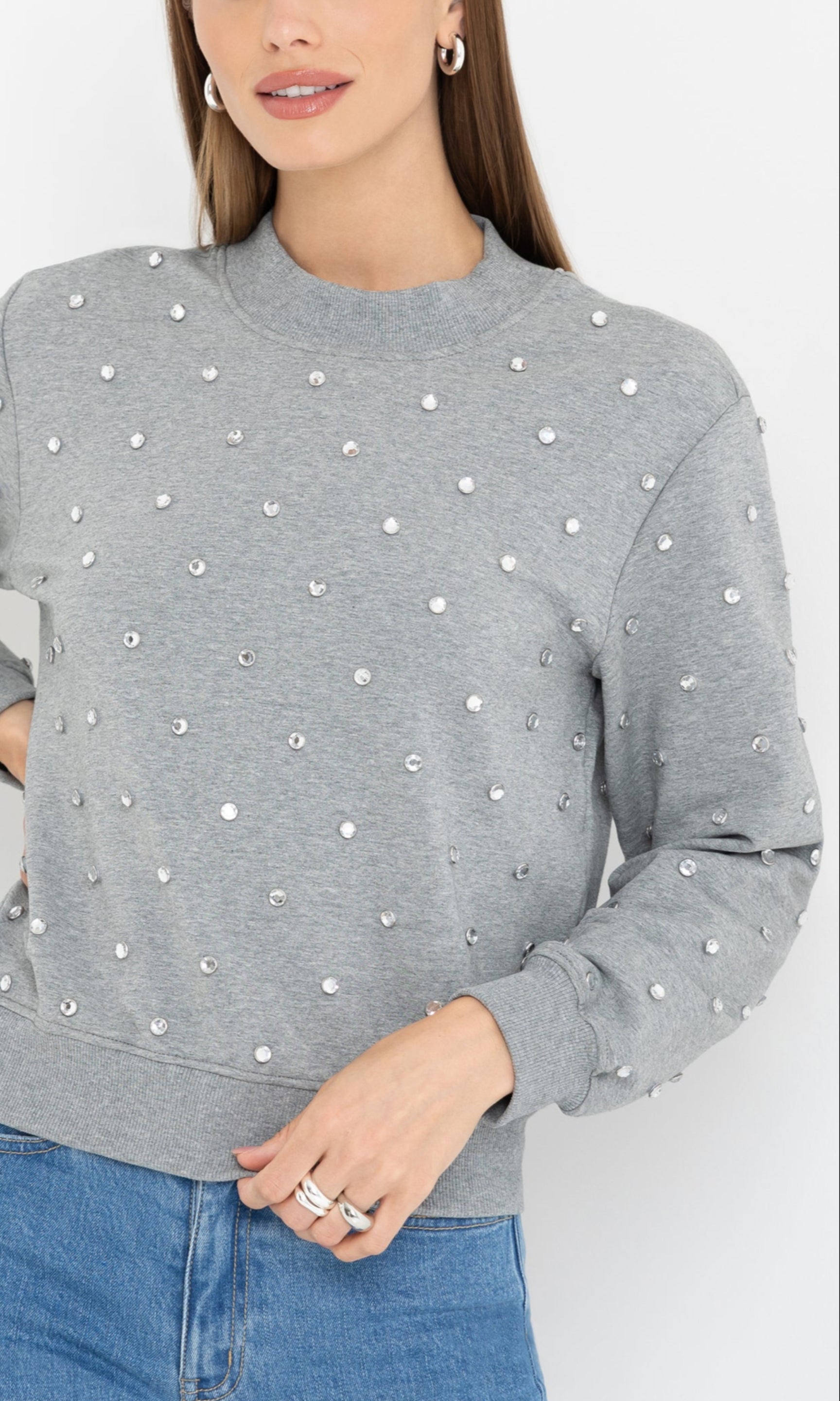 Close-up partial view of the Julie Crystal Stud Sweatshirt focusing on the crystal stud detailing and soft texture.