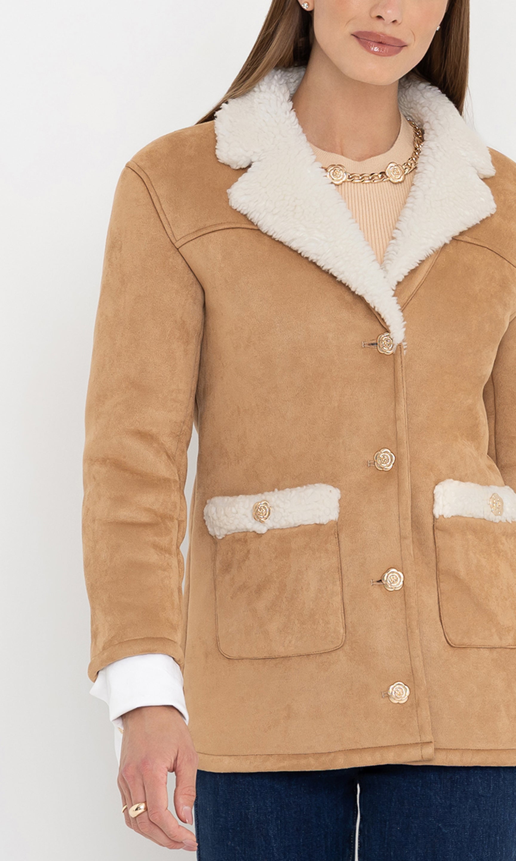 Close-up front view of the luvia faux shearling jacket highlighting the patch pockets.