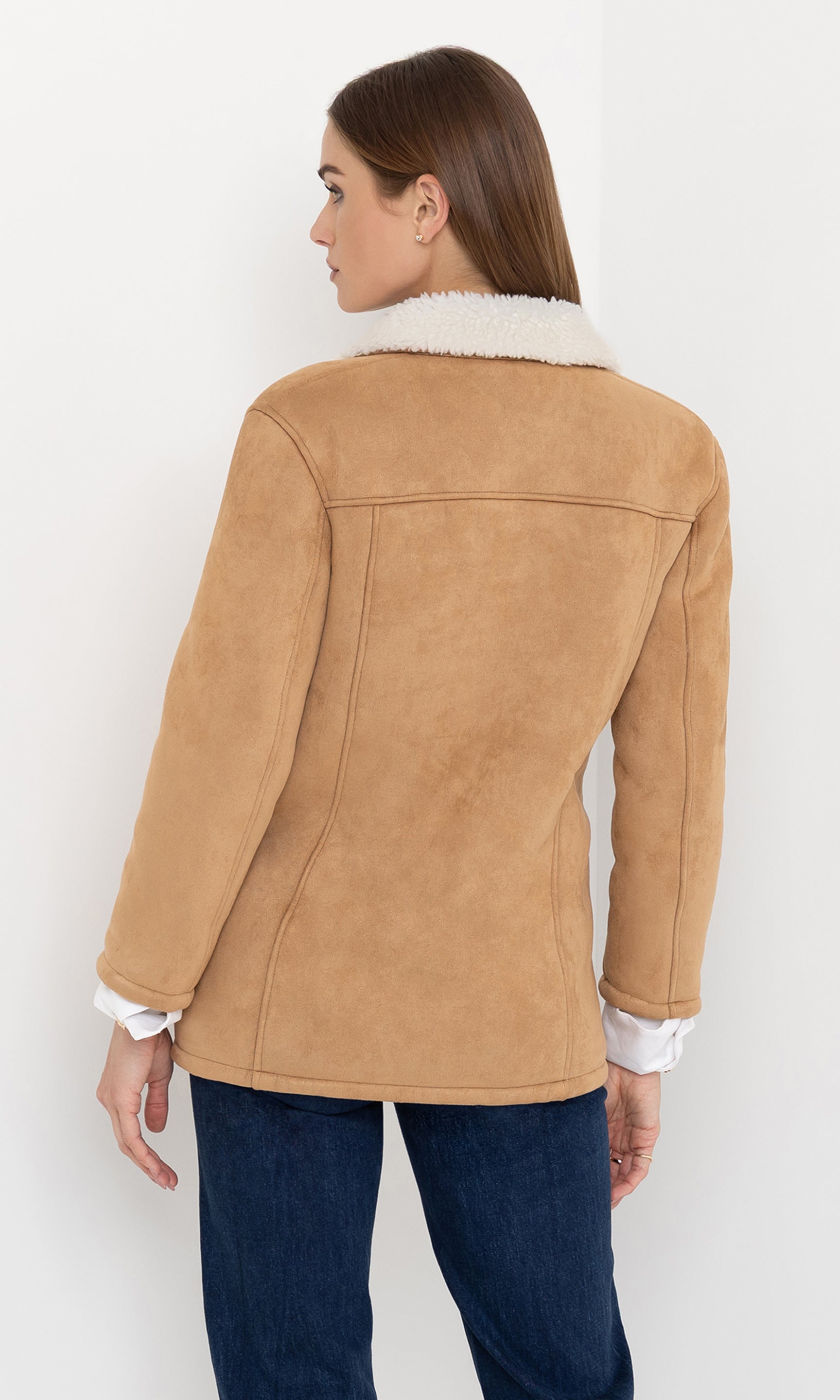 Back view of the luvia faux shearling jacket showing the relaxed fit.