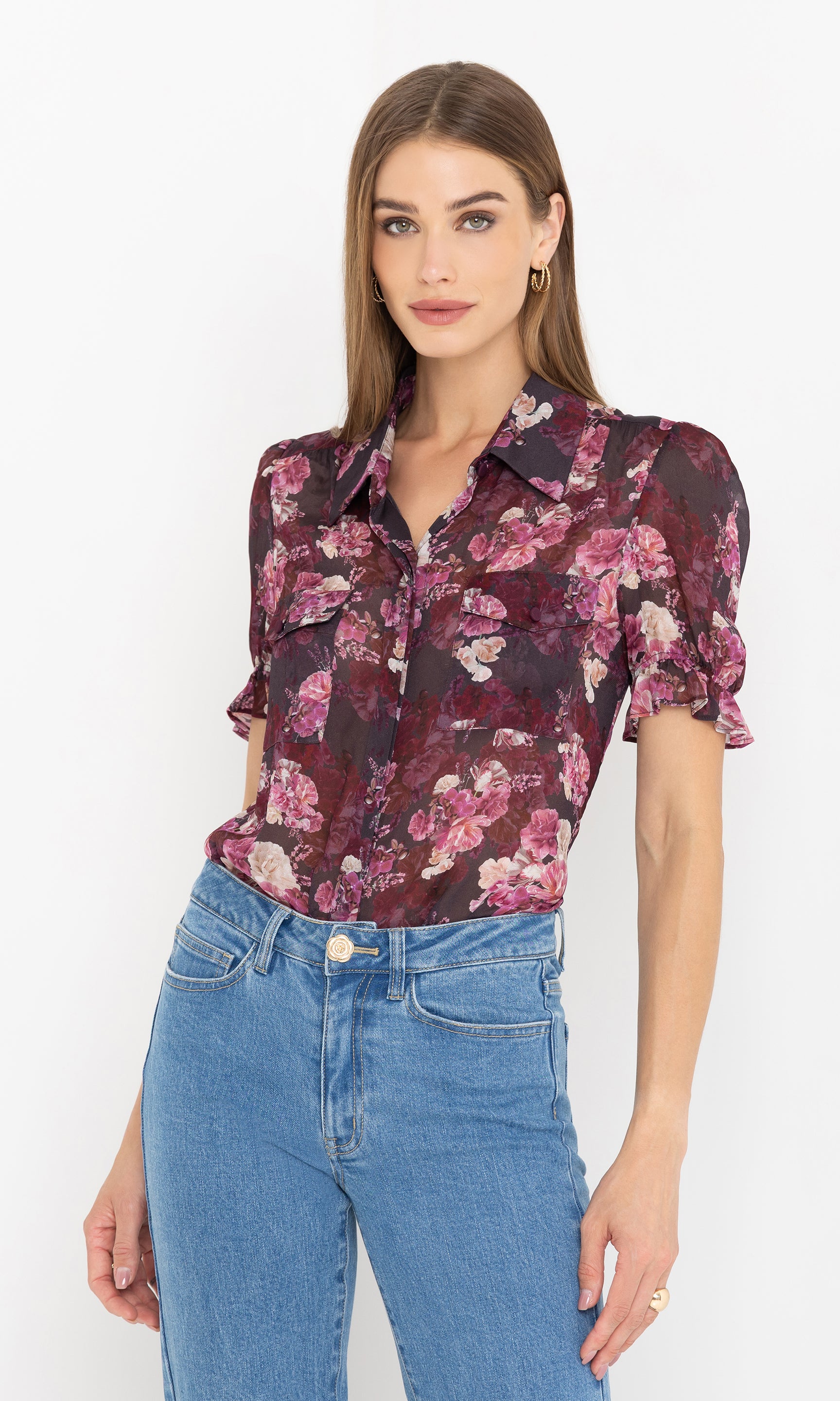 Slightly angled front view of the Mina Floral Georgette Shirt, showcasing its structured collar and button-down design.