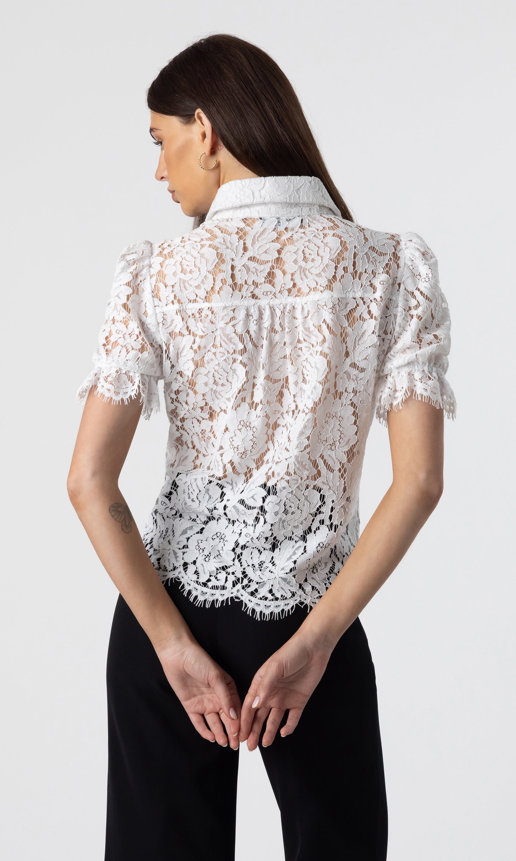 Rear view of the Mina Lace Shirt featuring full lace coverage and scalloped hem, revealing the detailed back design.