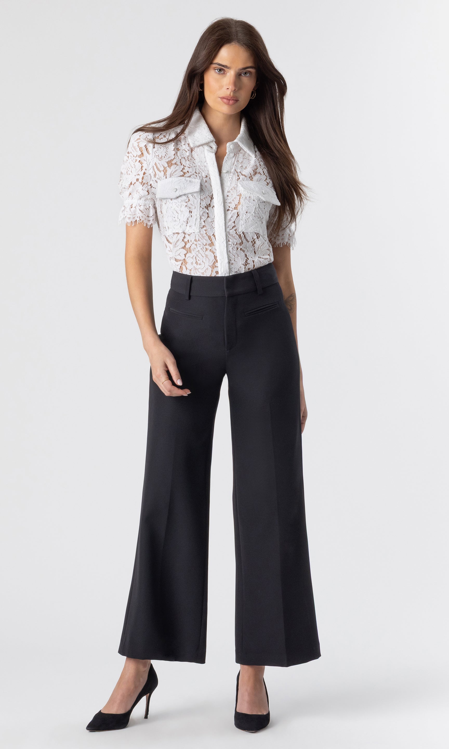 Full body view of the Mina Lace Shirt paired with wide-leg black trousers, showing the shirt’s relaxed yet elegant silhouette.