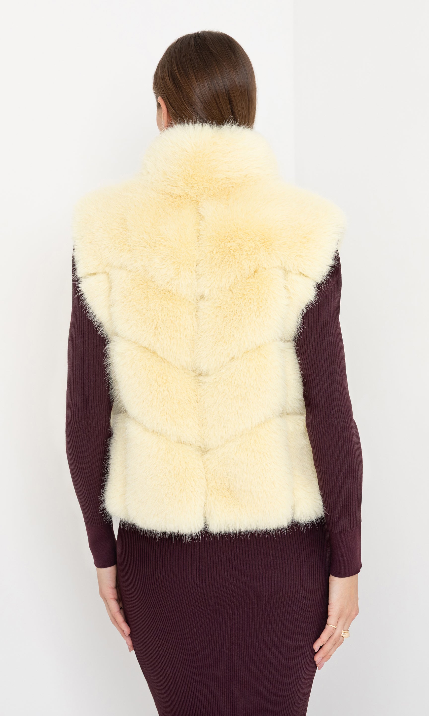 Rear view of Rosario Faux Fur Vest in cream, displaying the smooth faux fur finish.