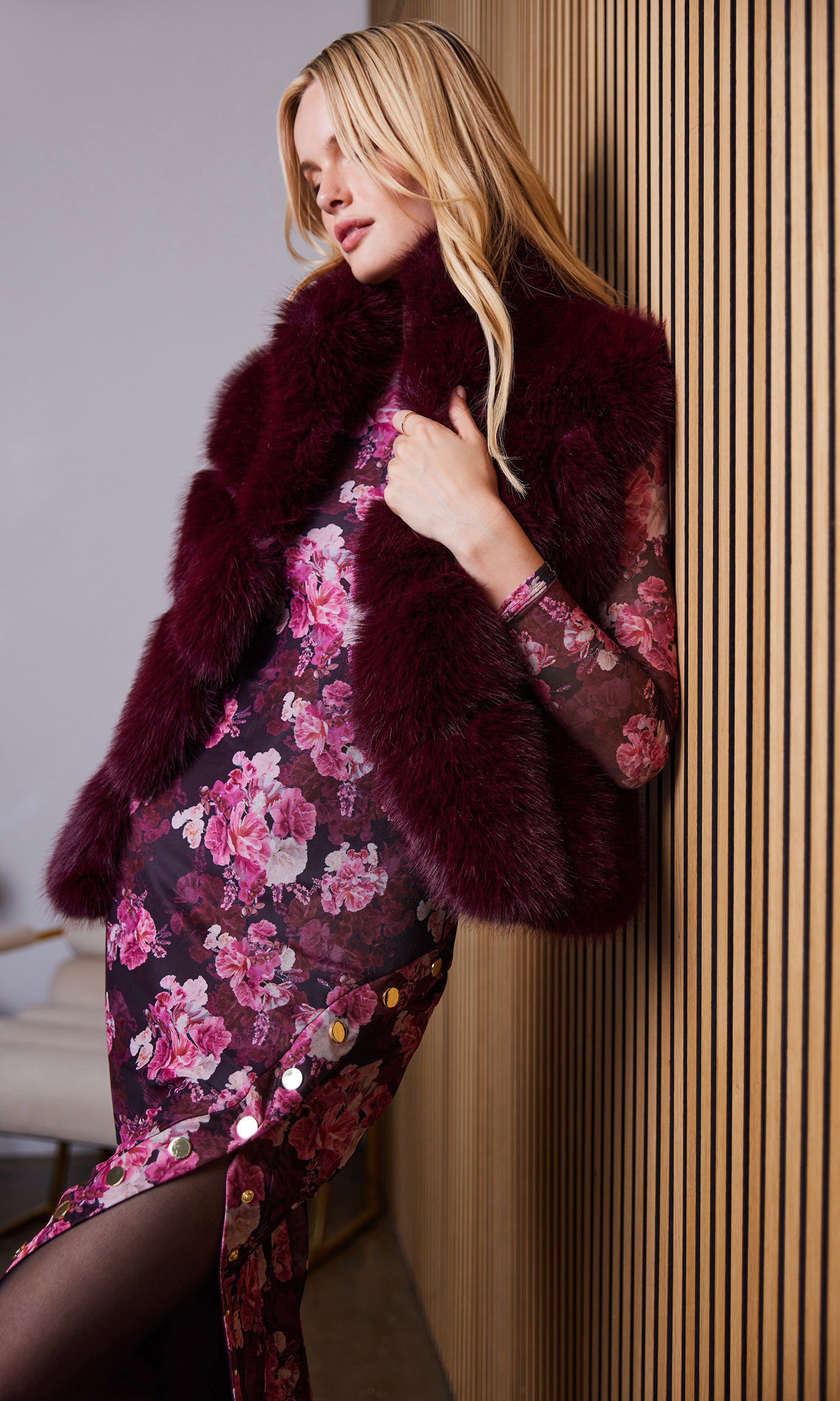 Side view of the rosario faux fur vest highlighting the faux fur texture.