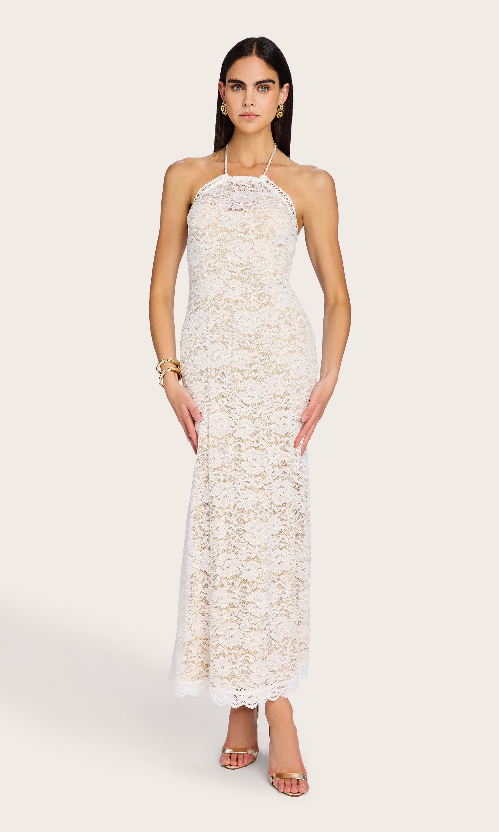 Full-body front view of the model wearing the Garcia Lace Dress, highlighting the halter neckline and floral lace texture.