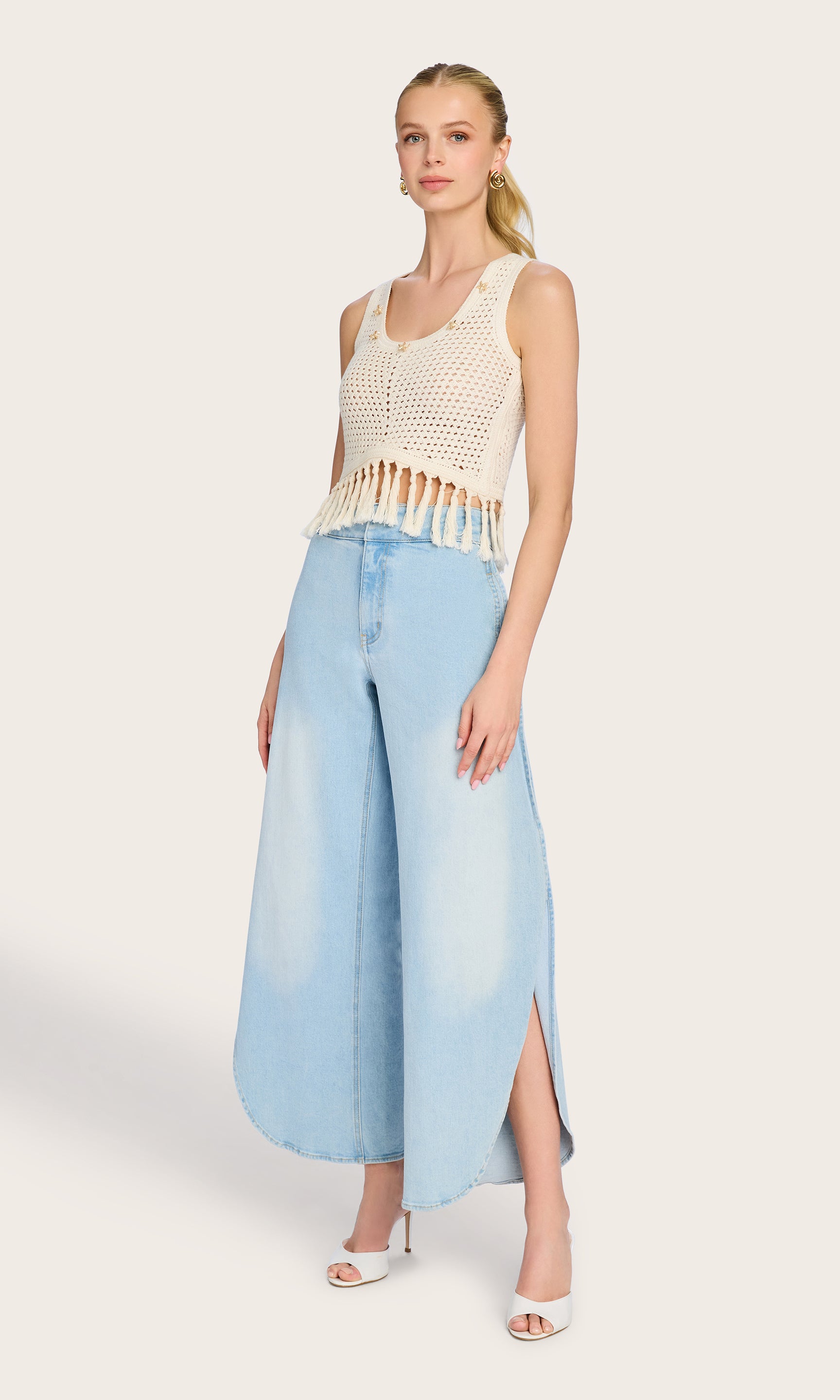 Full-body front view of the model wearing the Ginger Crochet Tank, creating a laid-back summer outfit with light-wash jeans.