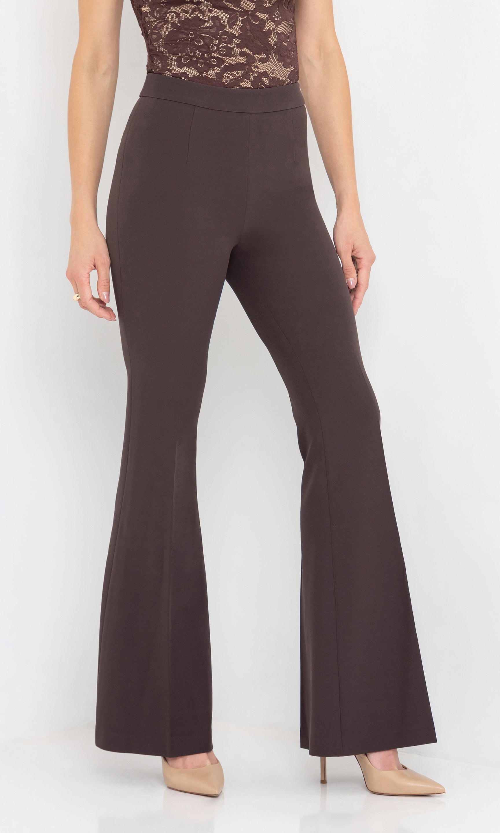Rear view of the wesley crepe pants highlighting the fitted waist and length.