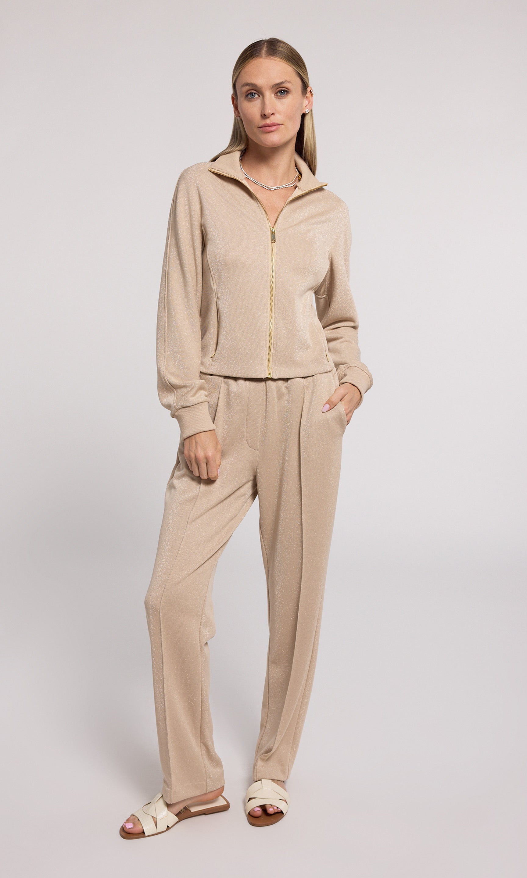 Truffle Ineza Shimmer Sweatshirt crafted from comfortable material, offering a stylish addition to any casual wardrobe.