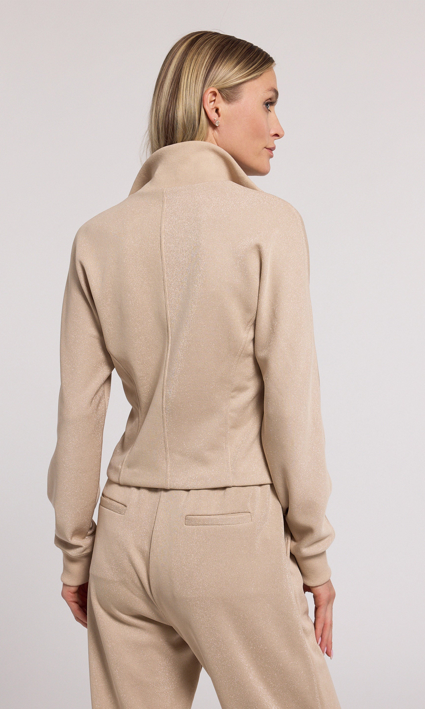 Truffle Ineza Shimmer Sweatshirt crafted from comfortable material, offering a stylish addition to any casual wardrobe.