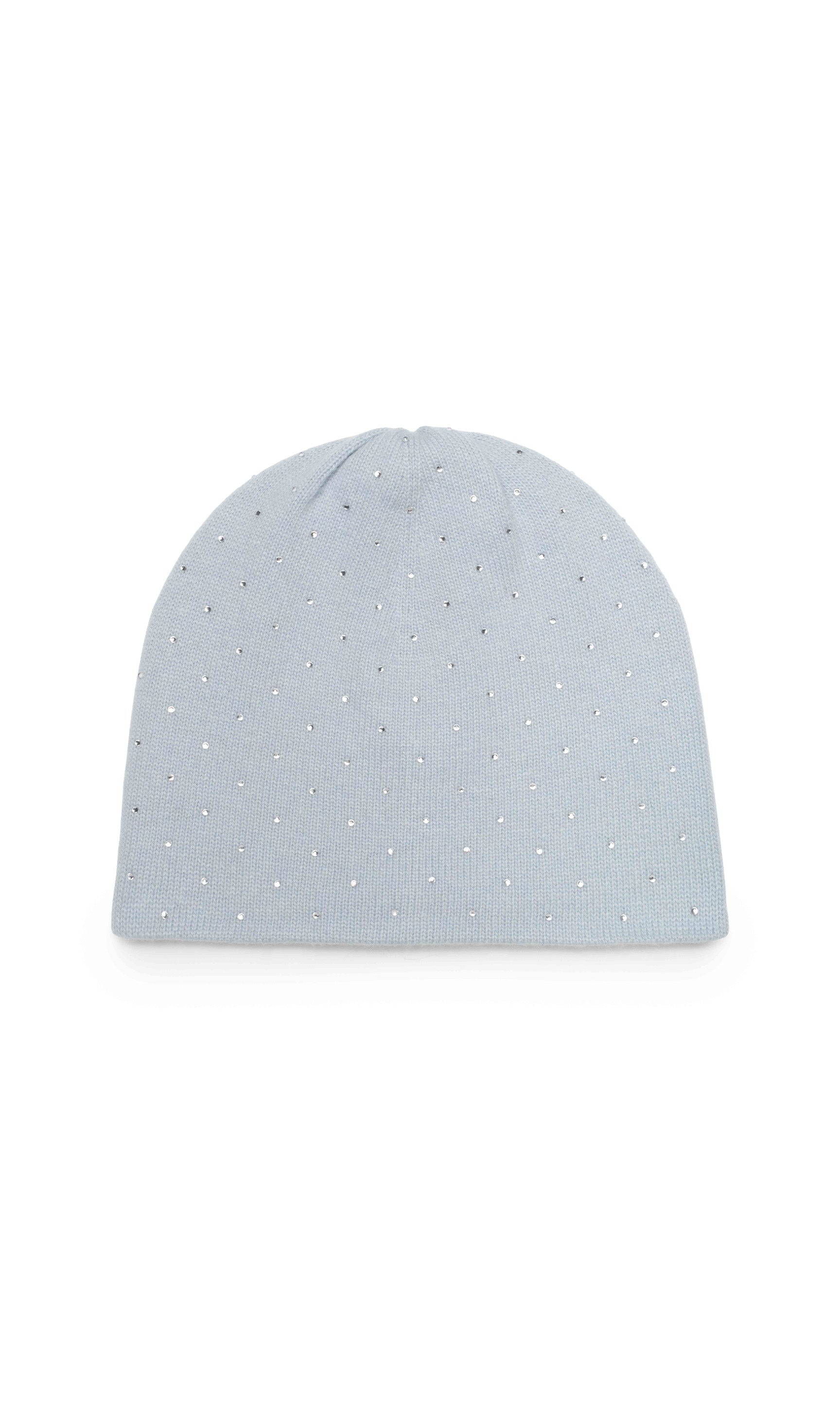 Light blue beanie with small white crystals on a white background