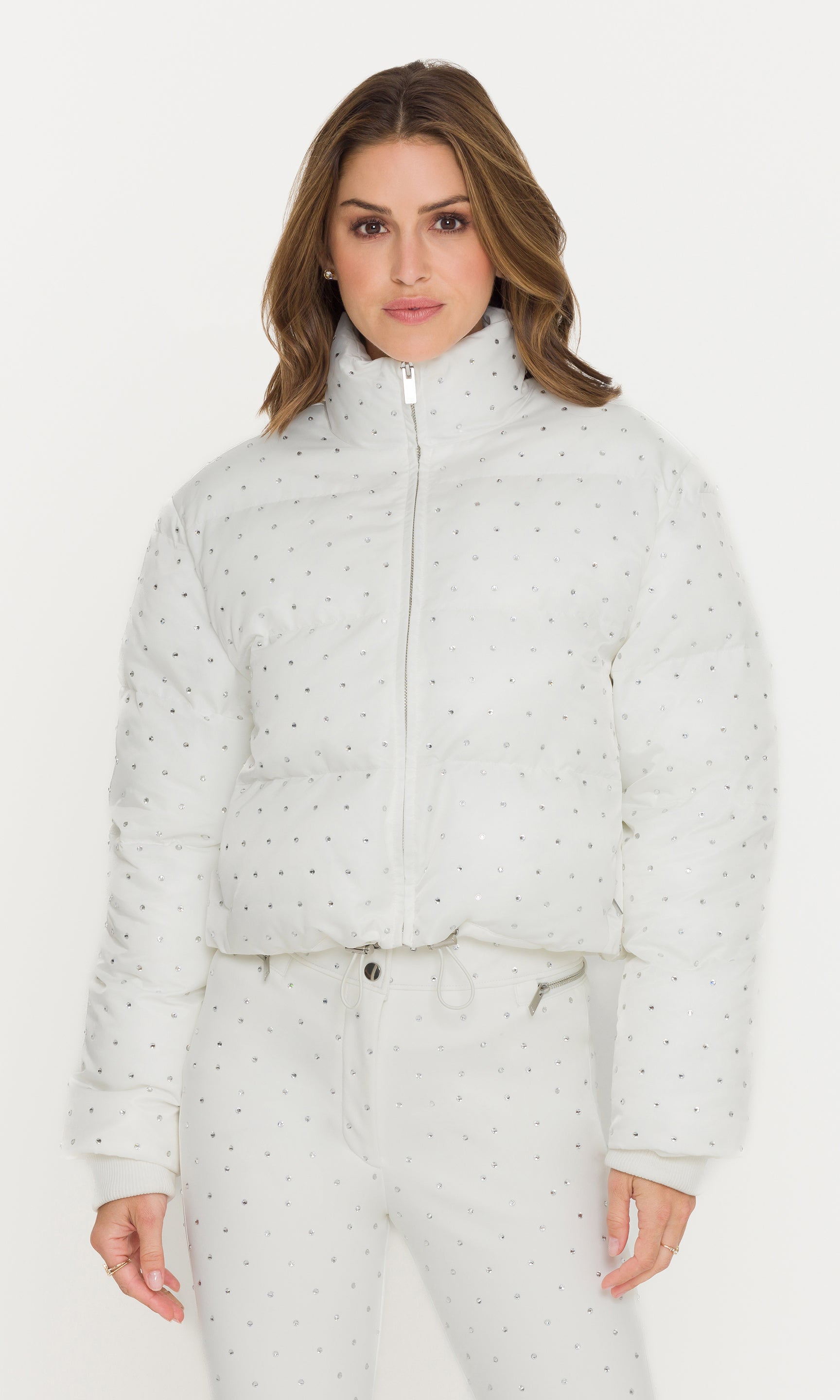 Woman wearing a white jacket on a white background