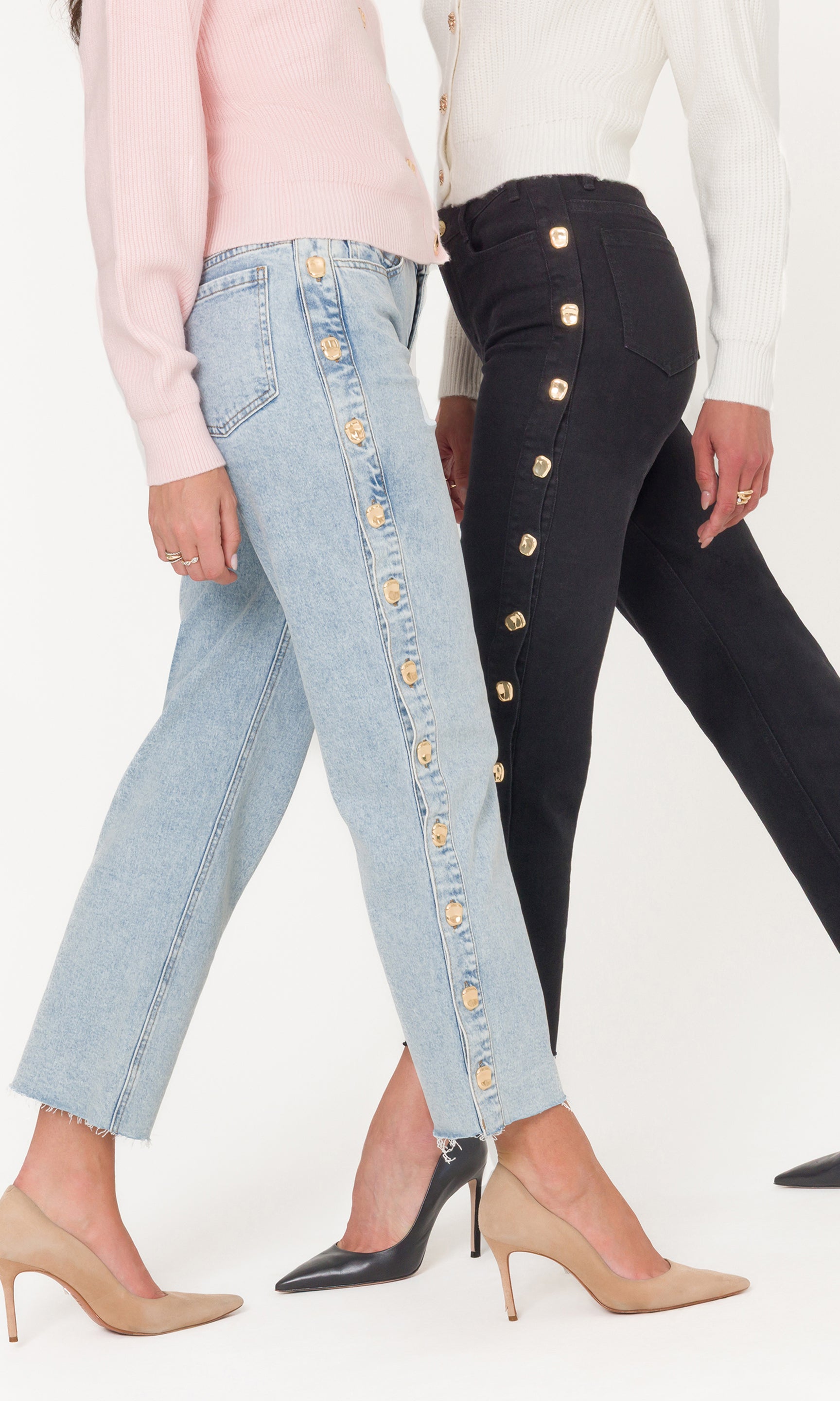 Two pairs of jeans with button details worn by models on a white background