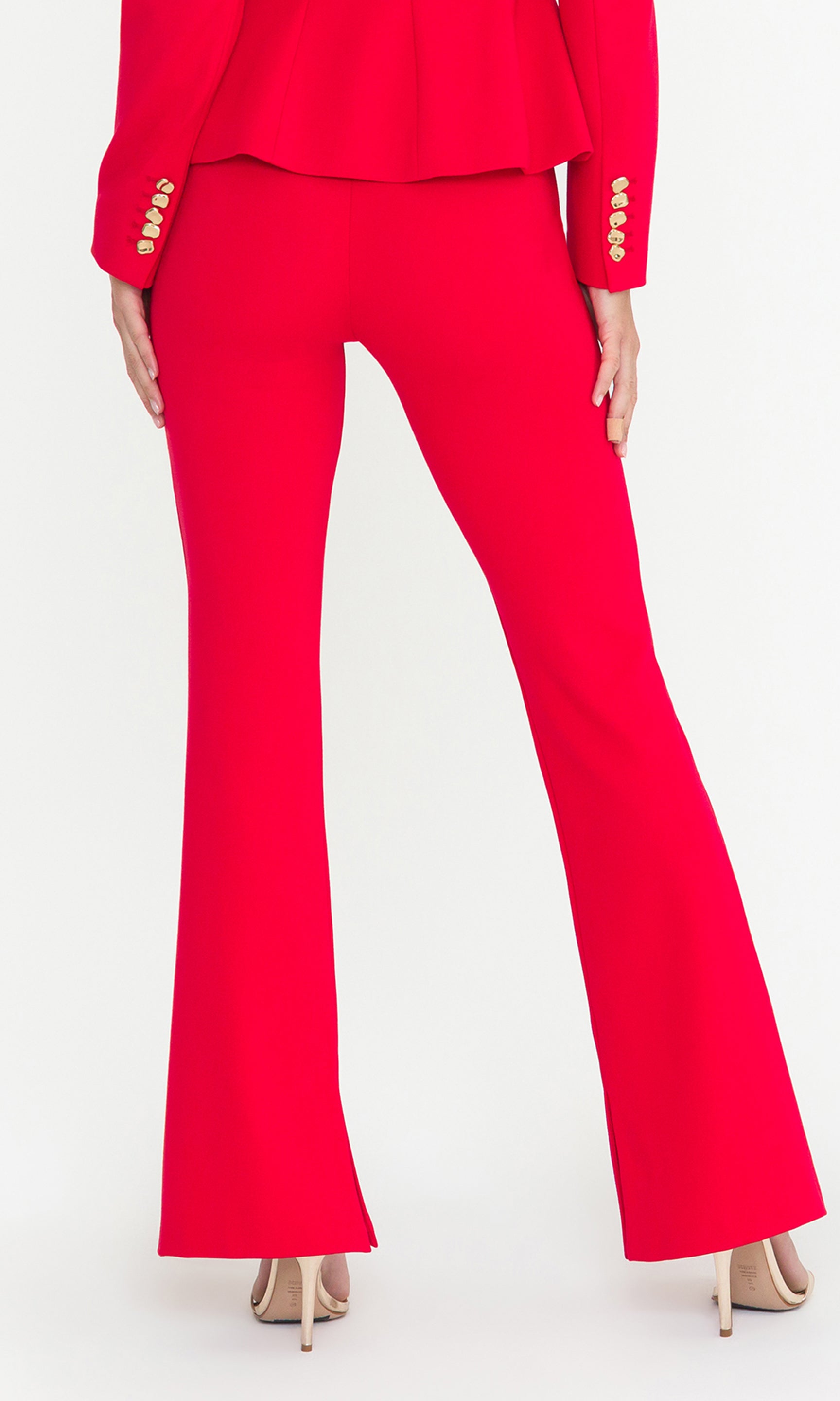 Red suit with flared pants on a white background