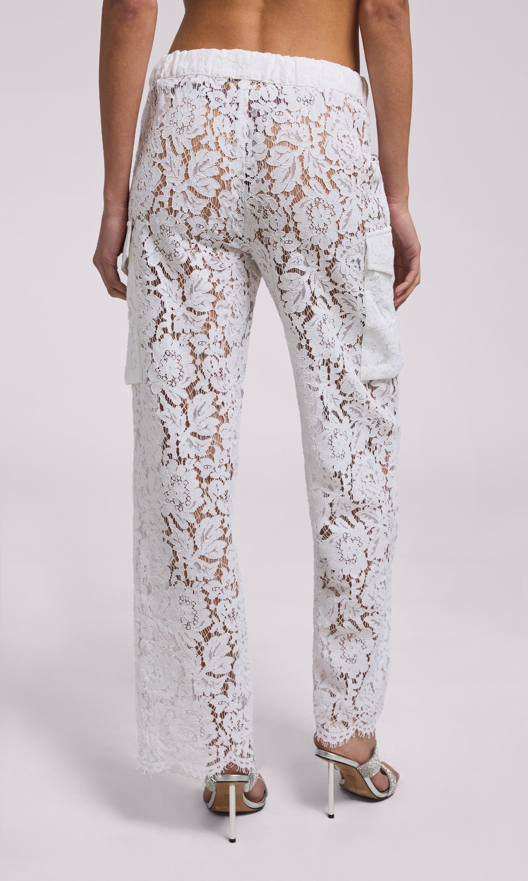 Palmer Lace Cargo Pant in white lace, showcasing a fashionable and eye-catching style for any outfit.