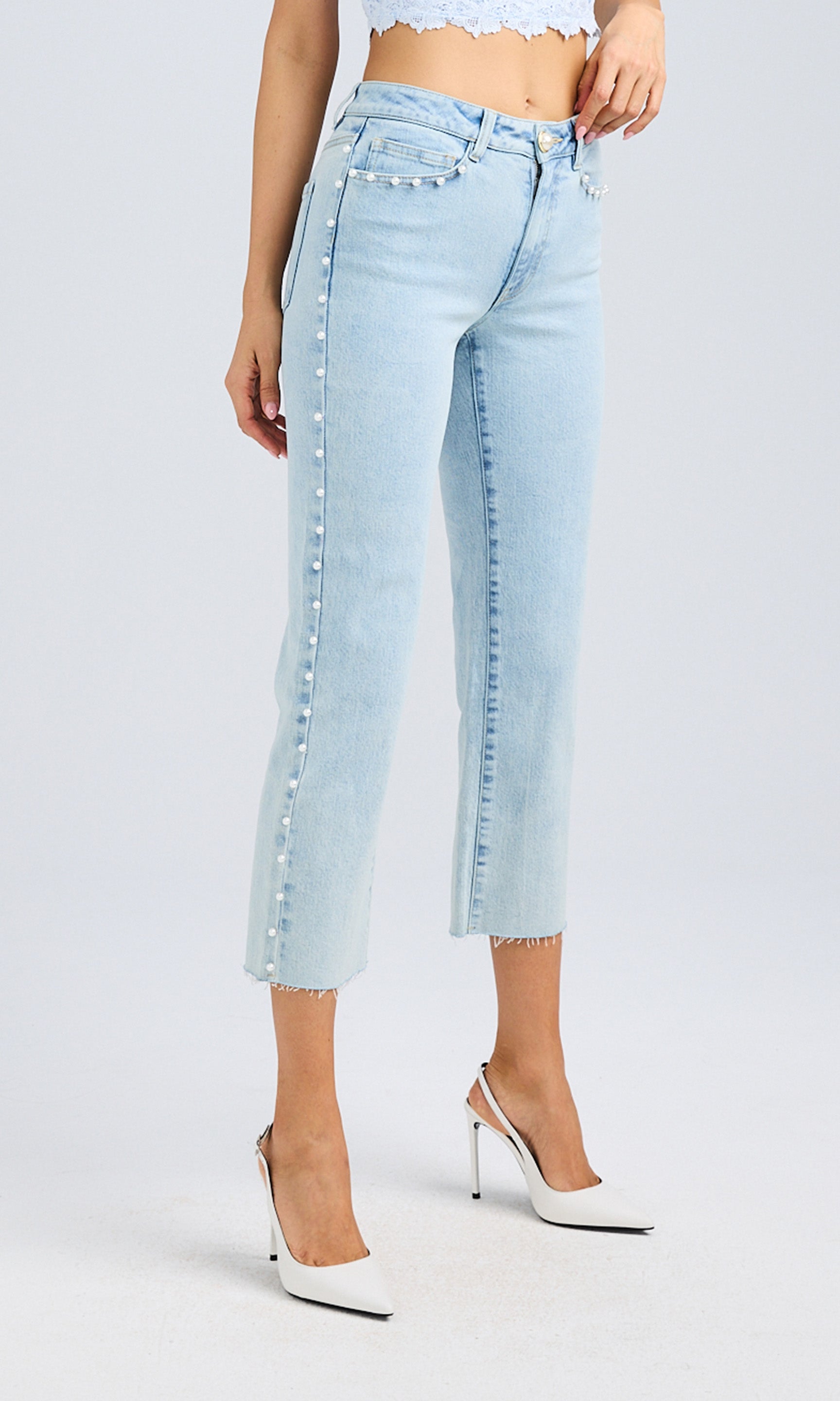 Front view of the jeans, emphasizing the structured cut and tailored seams.