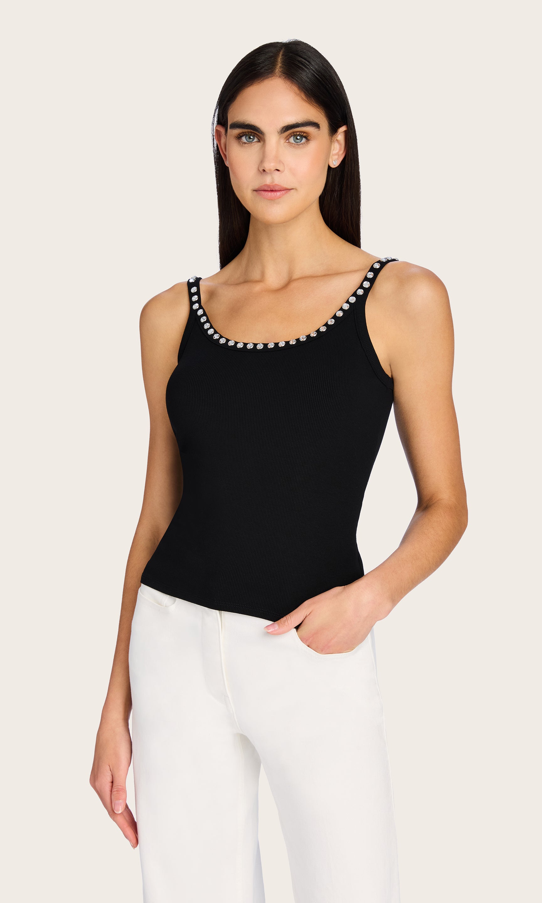 Front view of the Iris Crystal Tank Top paired with wide-leg white pants, emphasizing the flattering scoop neckline and shimmering crystal details.