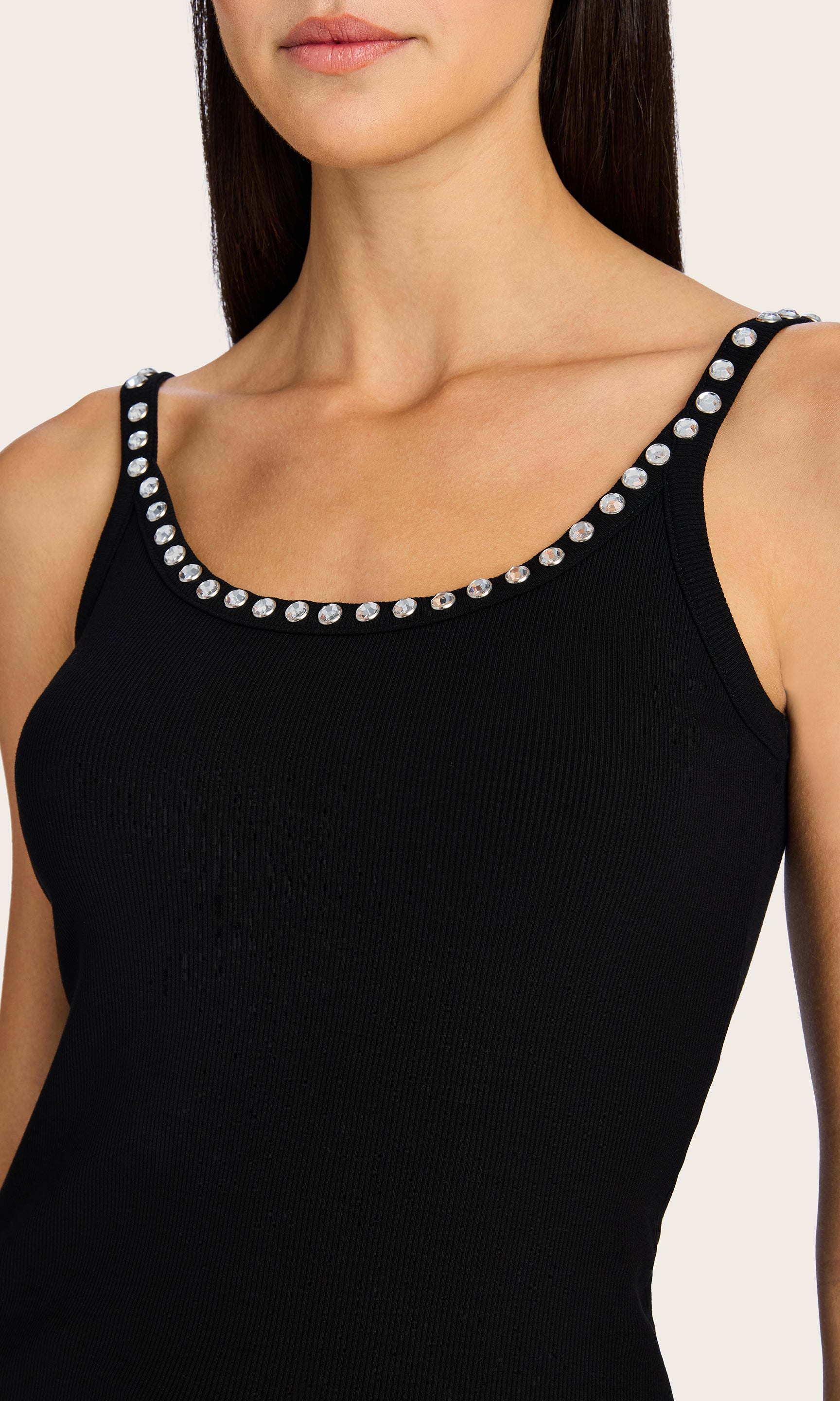 Close-up of the neckline on the Iris Crystal Tank Top, highlighting the fine ribbed jersey fabric and sparkling crystal embellishments.