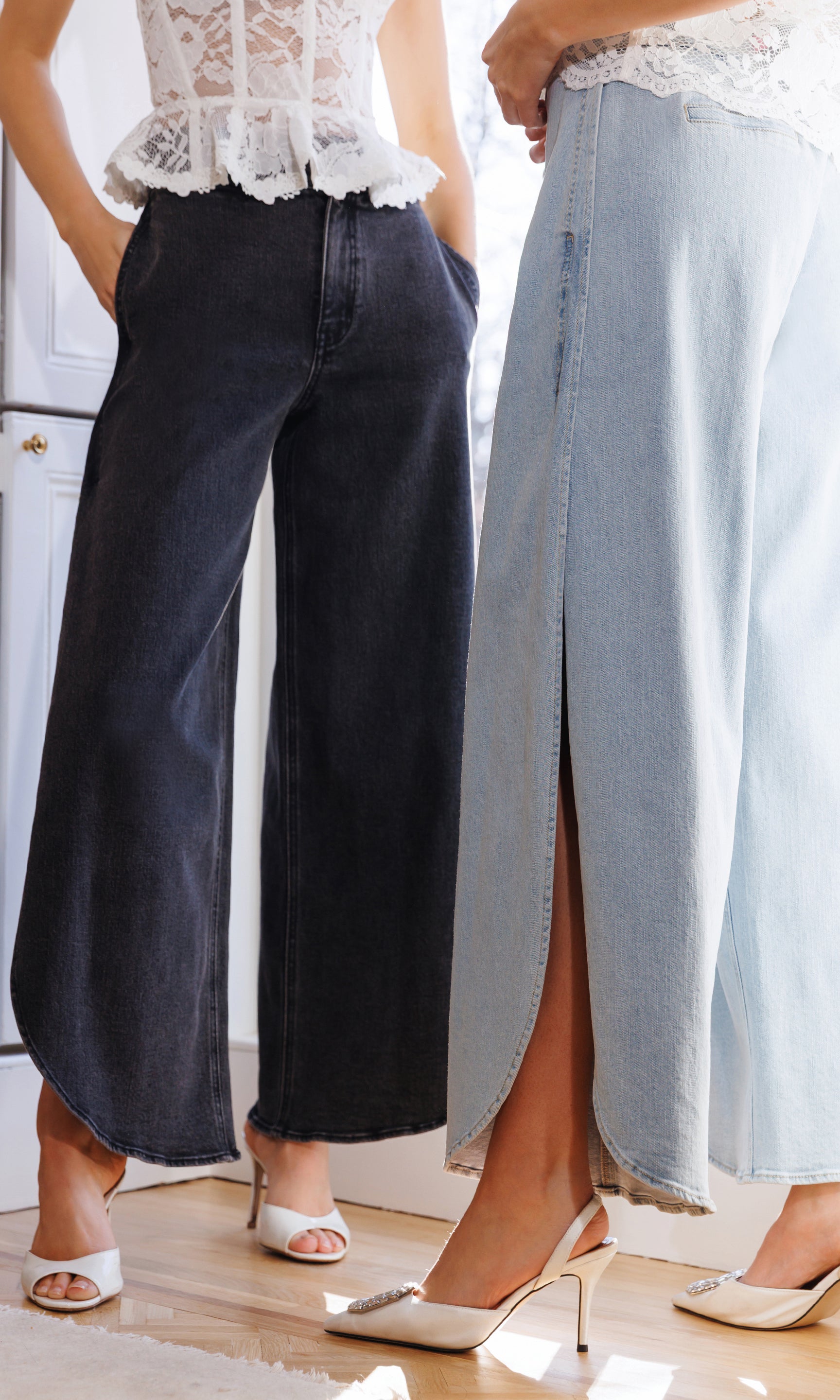 Two women wearing wide-leg pants with a neutral background