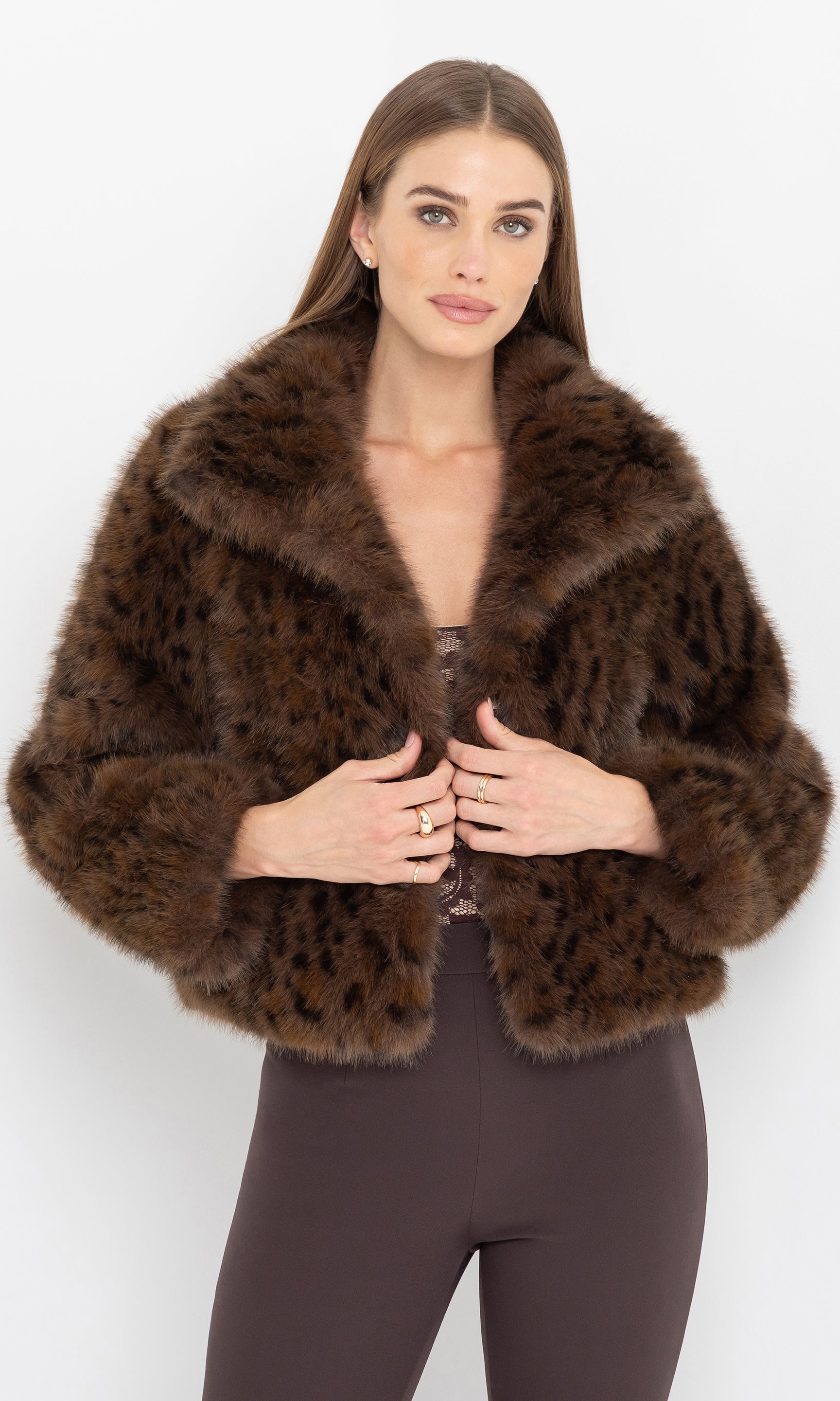 Front view of the lexy leopard faux fur jacket with cropped silhouette.