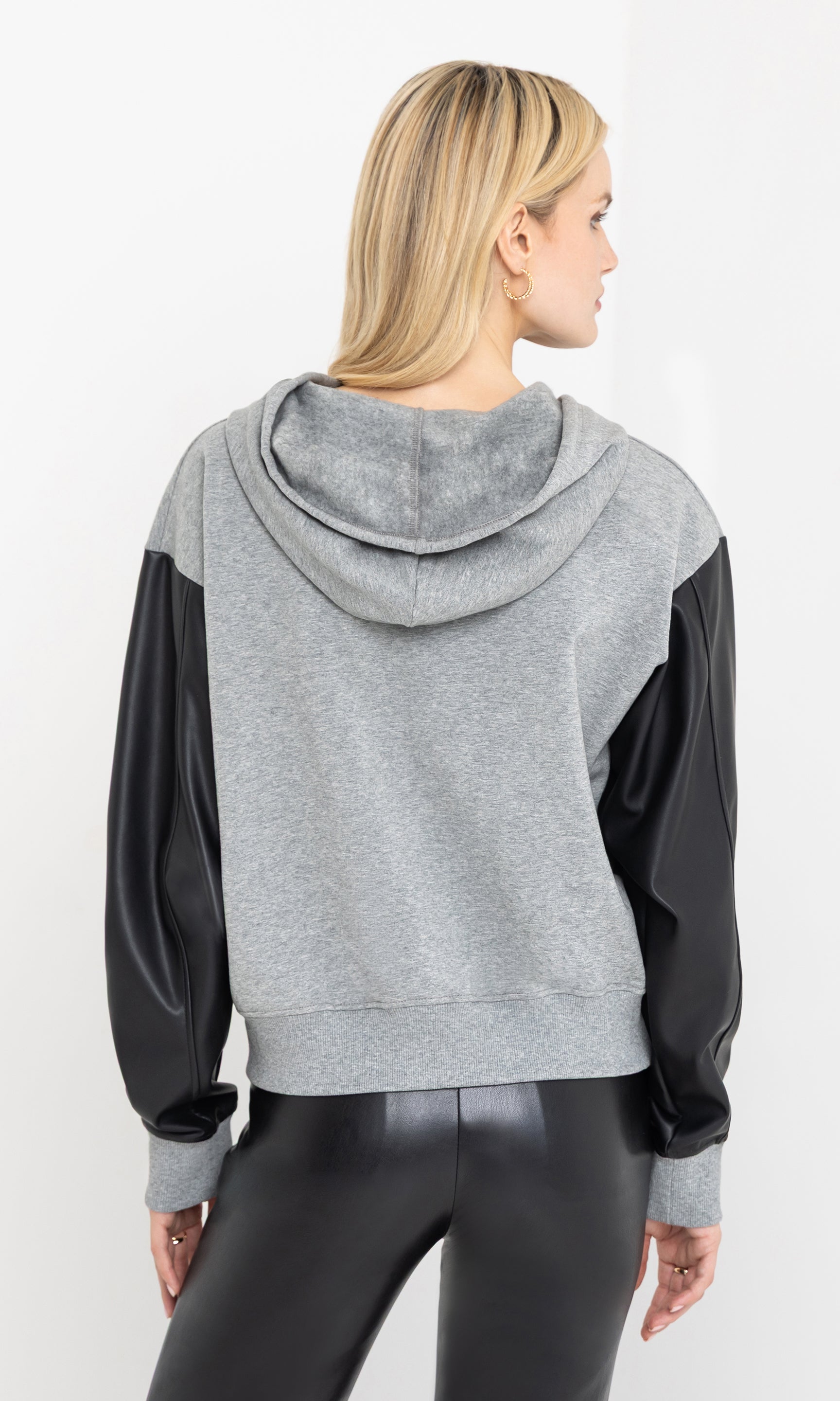 Back view of the lisbet vegan leather combo hoodie showing the hood.