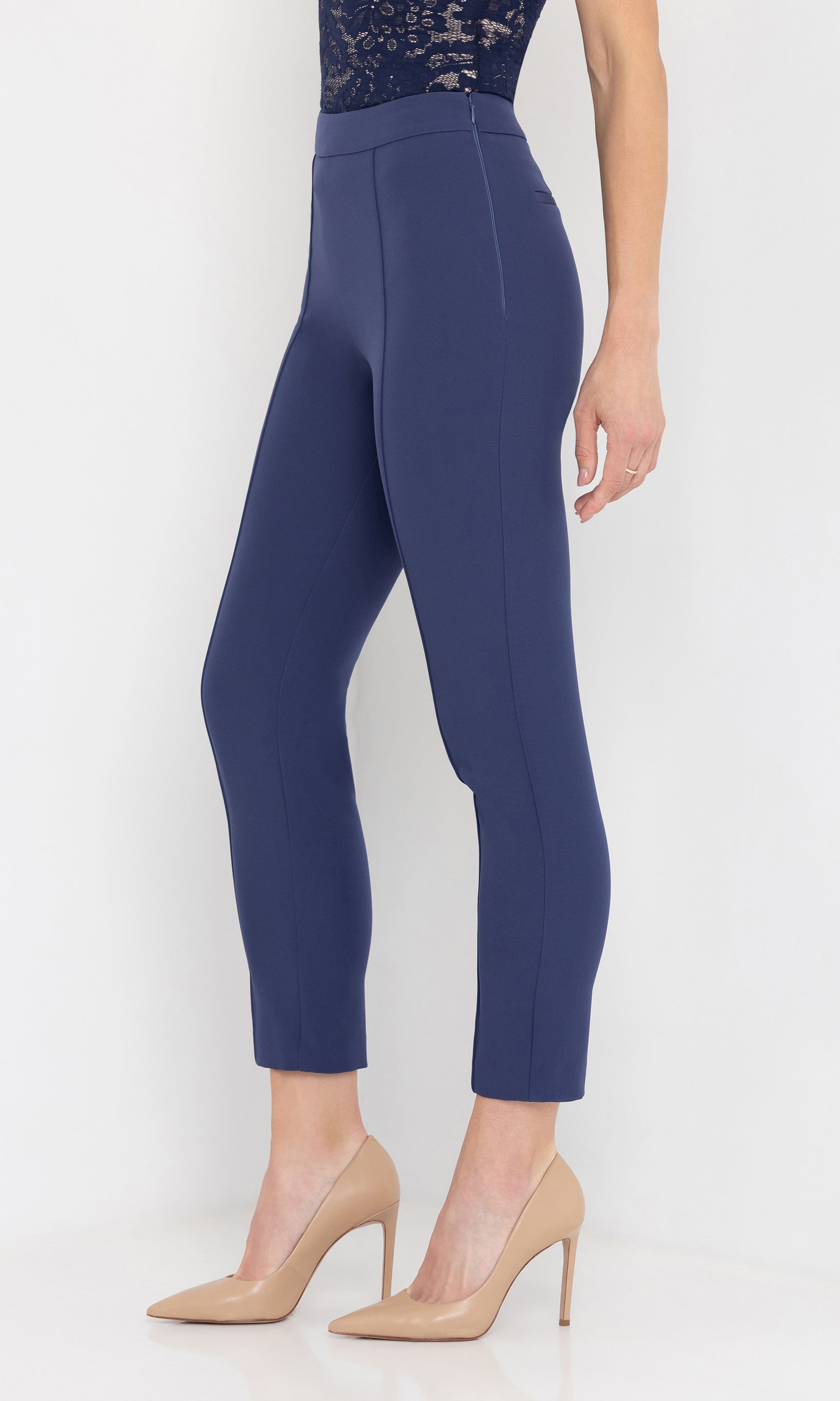 Side angled view of the lonny crepe pants highlighting the clean tailoring.