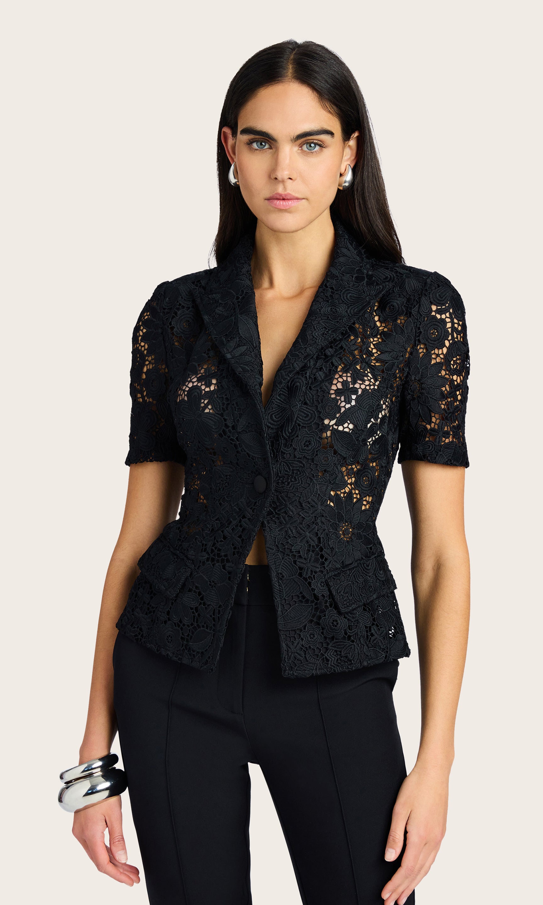 Front view of the Melbourne Lace Blazer styled with tailored pants