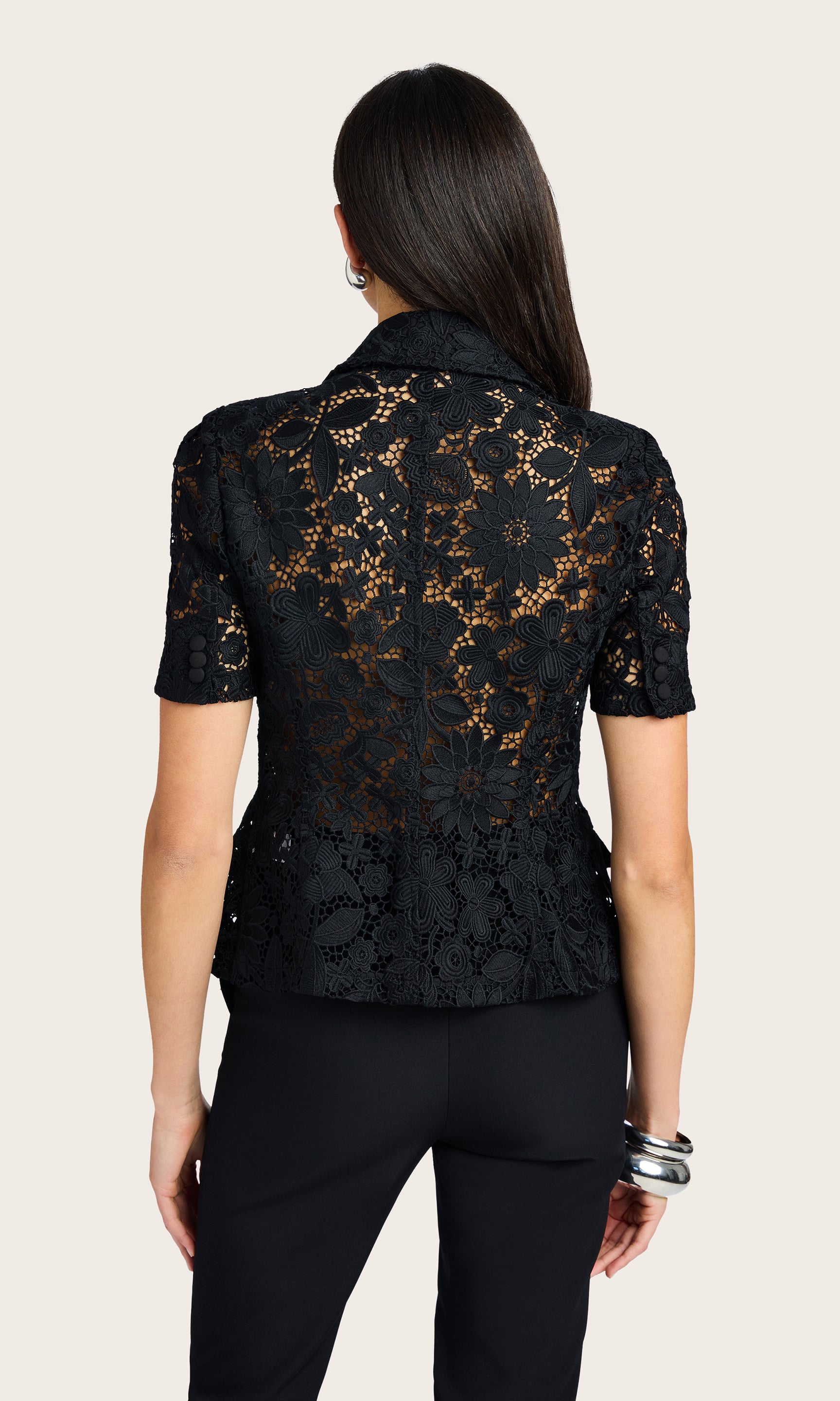 Rear view of the Melbourne Lace Blazer showcasing its cinched waist and lace detail