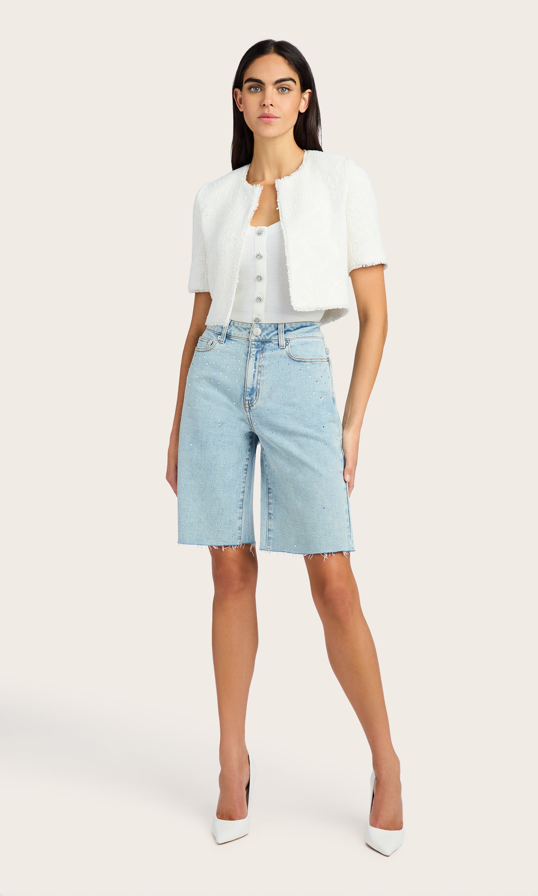 Full-body view of the Nikki Tweed Jacket styled with high-waisted shorts. Shows the full outfit silhouette.