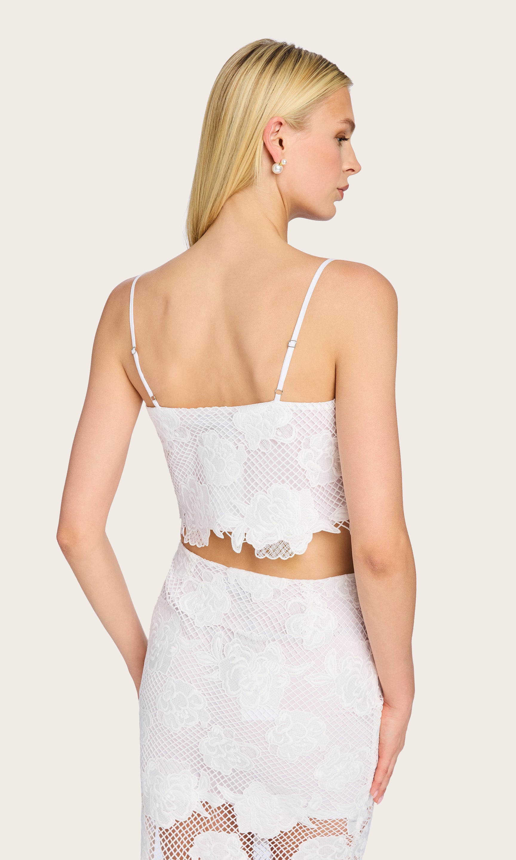 Rear view of the Norma Flower Mesh Cami featuring the exposed zipper and clean bandeau-style back.