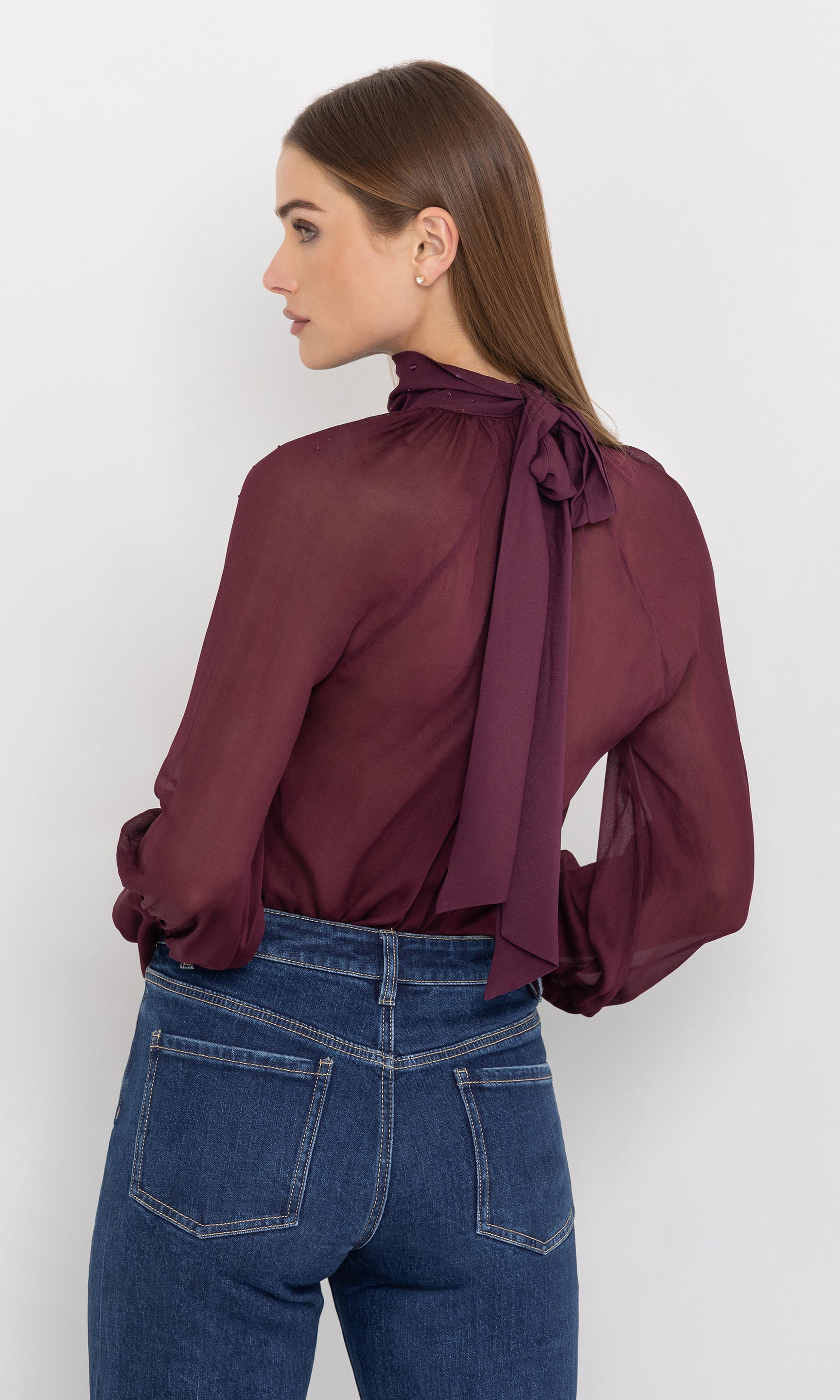 Rear view of the noor crystal blouse highlighting high neck tie.