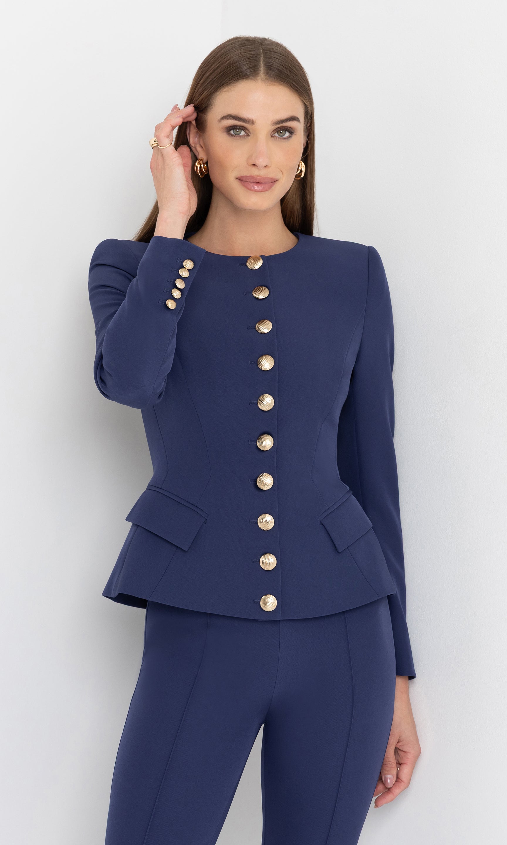 Three-quarter front view of the model wearing the ophelia crepe jacket, styled with sleek tailoring for a polished look.