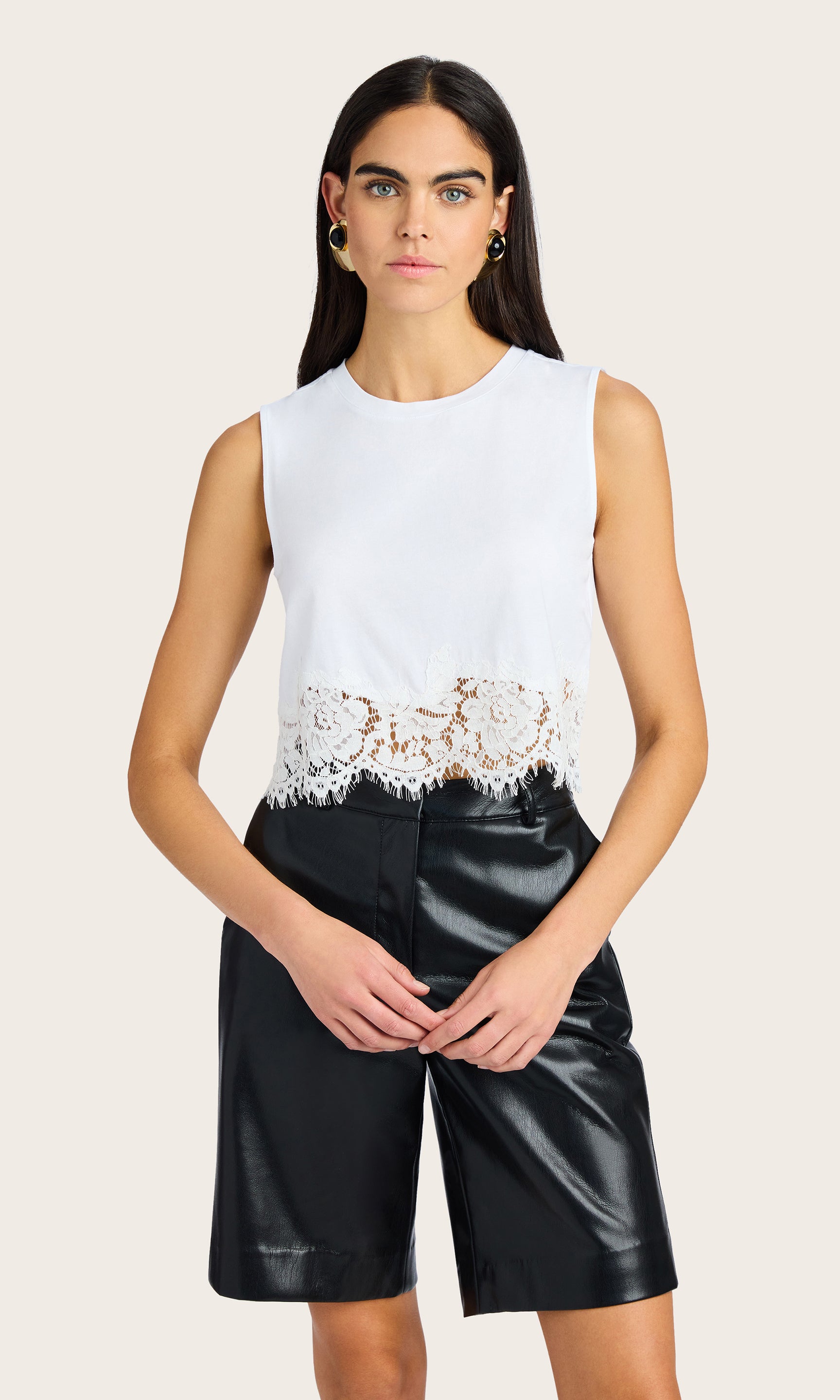 Front view of the Palani Lace Combo Top paired with tailored shorts