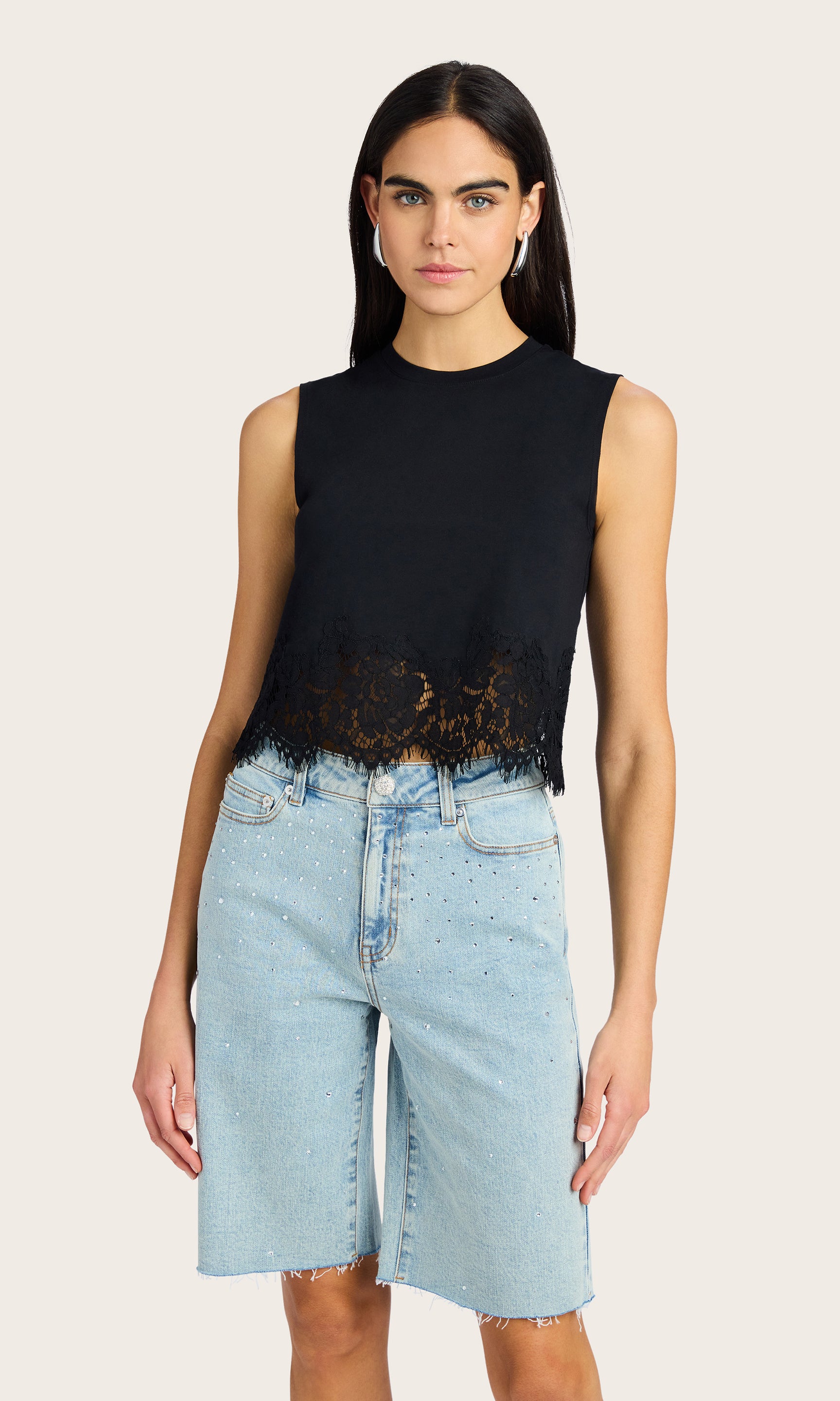 Front view of the Palani Lace Combo Top styled with denim shorts