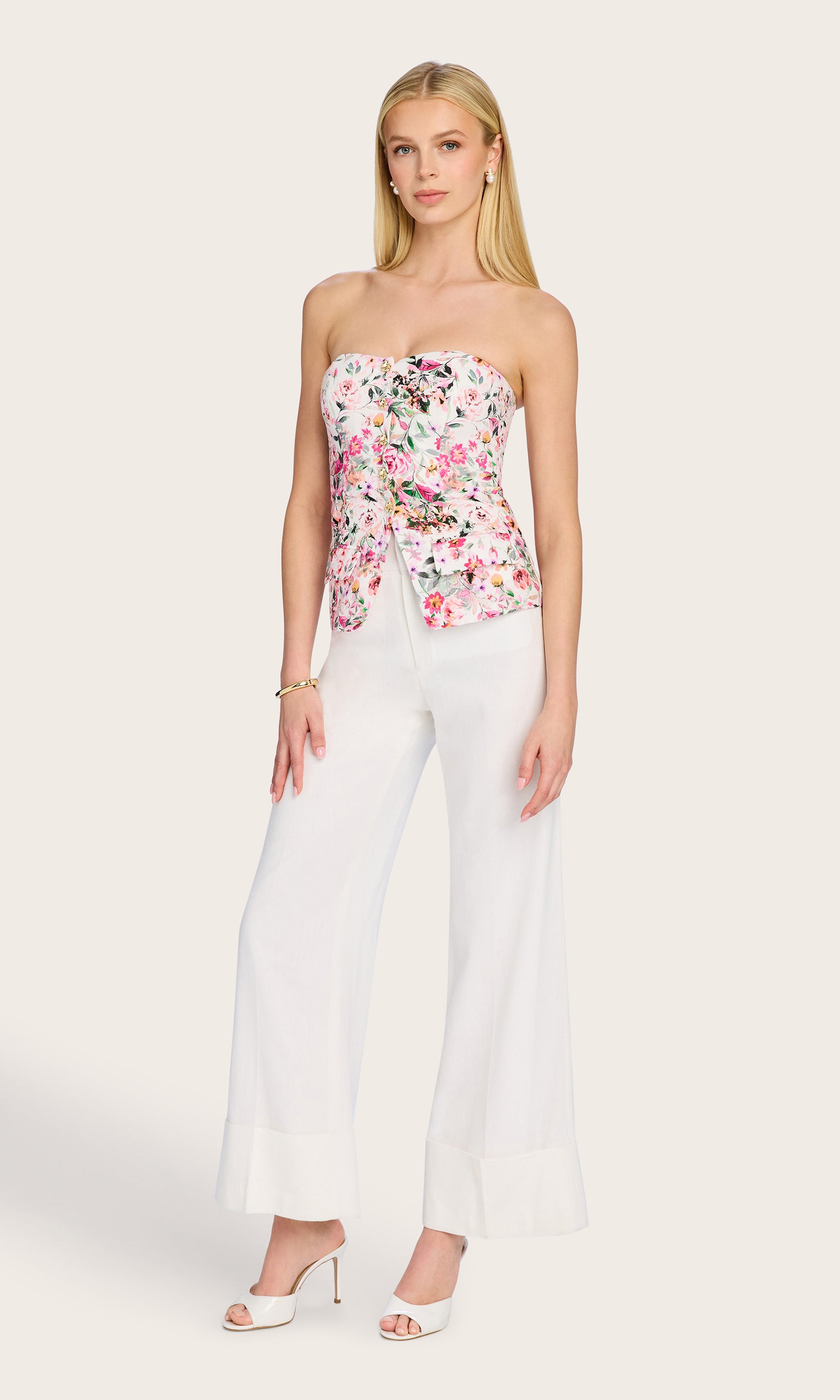 Full body shot presenting a polished styling option with wide-leg trousers