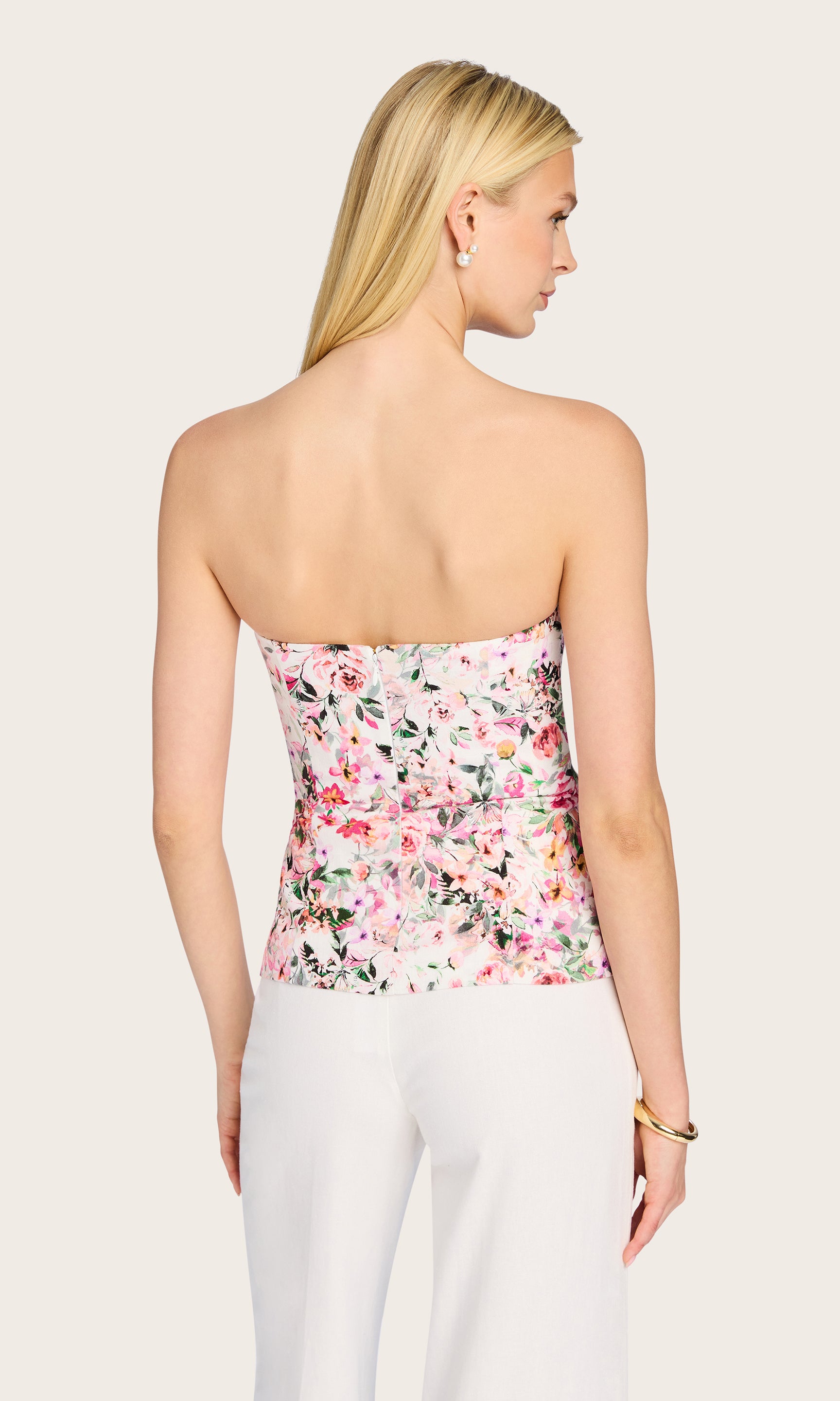 Rear view highlighting the strapless back and tailored fit of the Quinn Floral Linen Vestier
