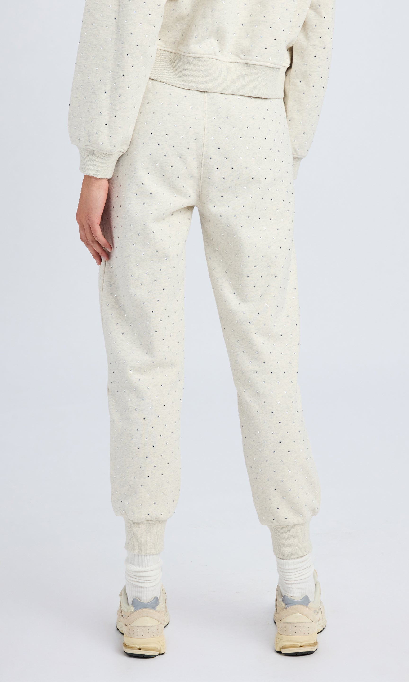 back detailed view of light grey crystalized sweatpants