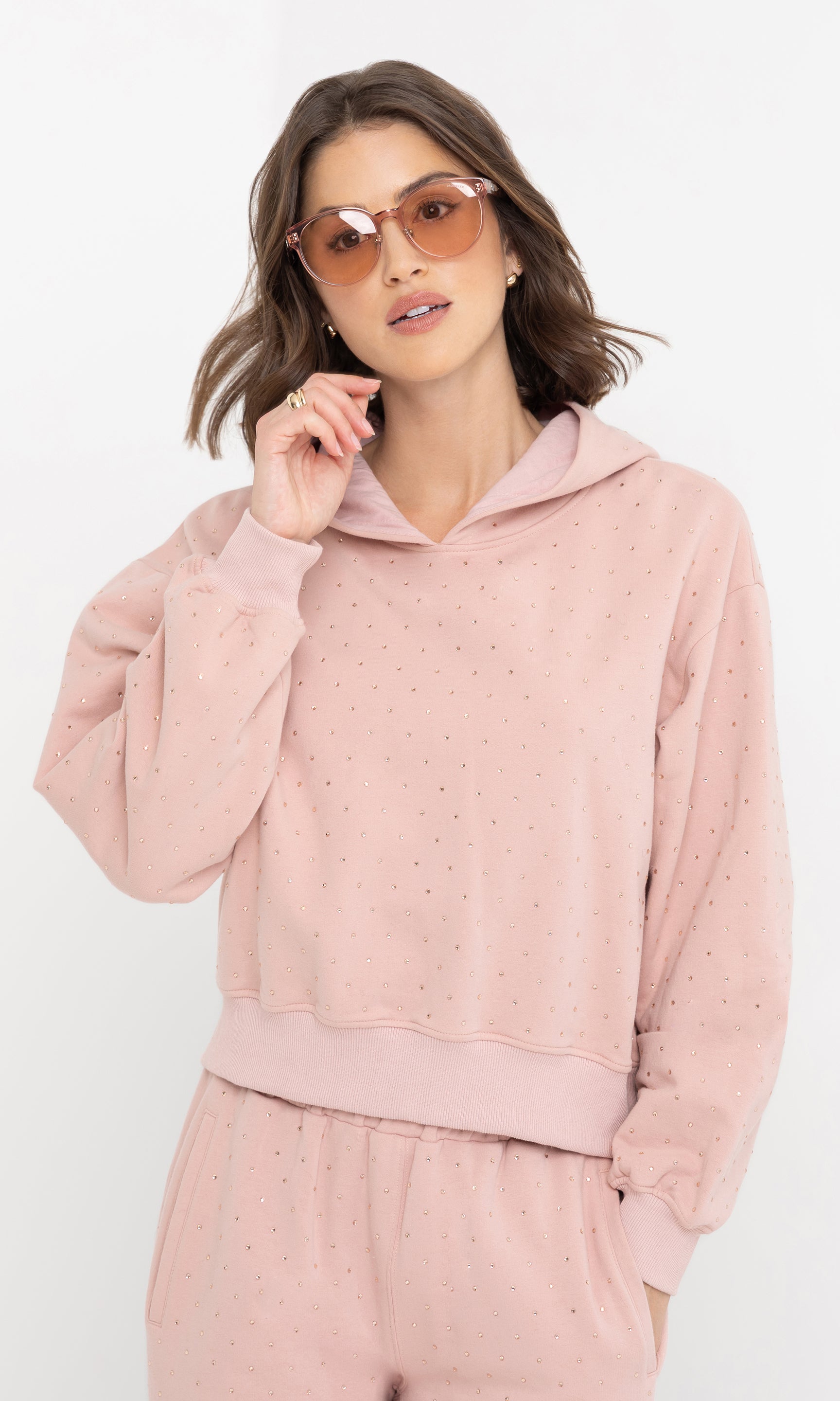 Front view of the model wearing the renae crystal hoodie with relaxed fit.