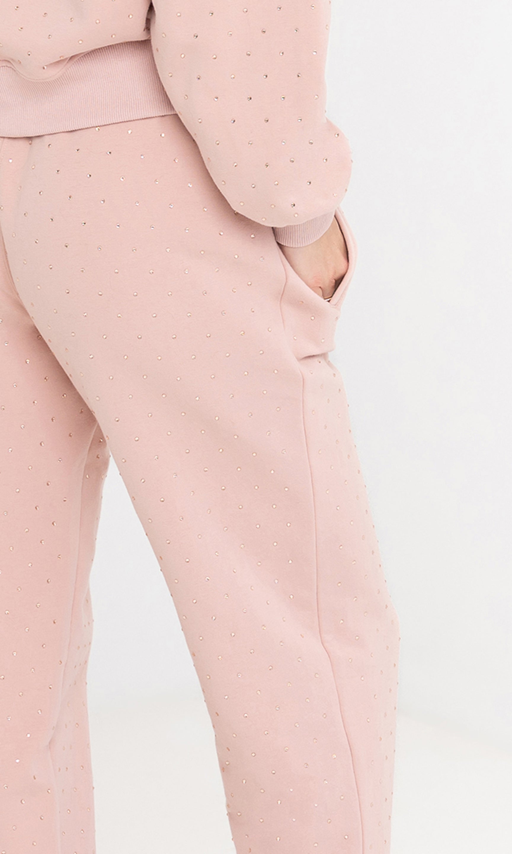 Close-up side view of the ruel crystal sweatpants highlighting the crystal accents.