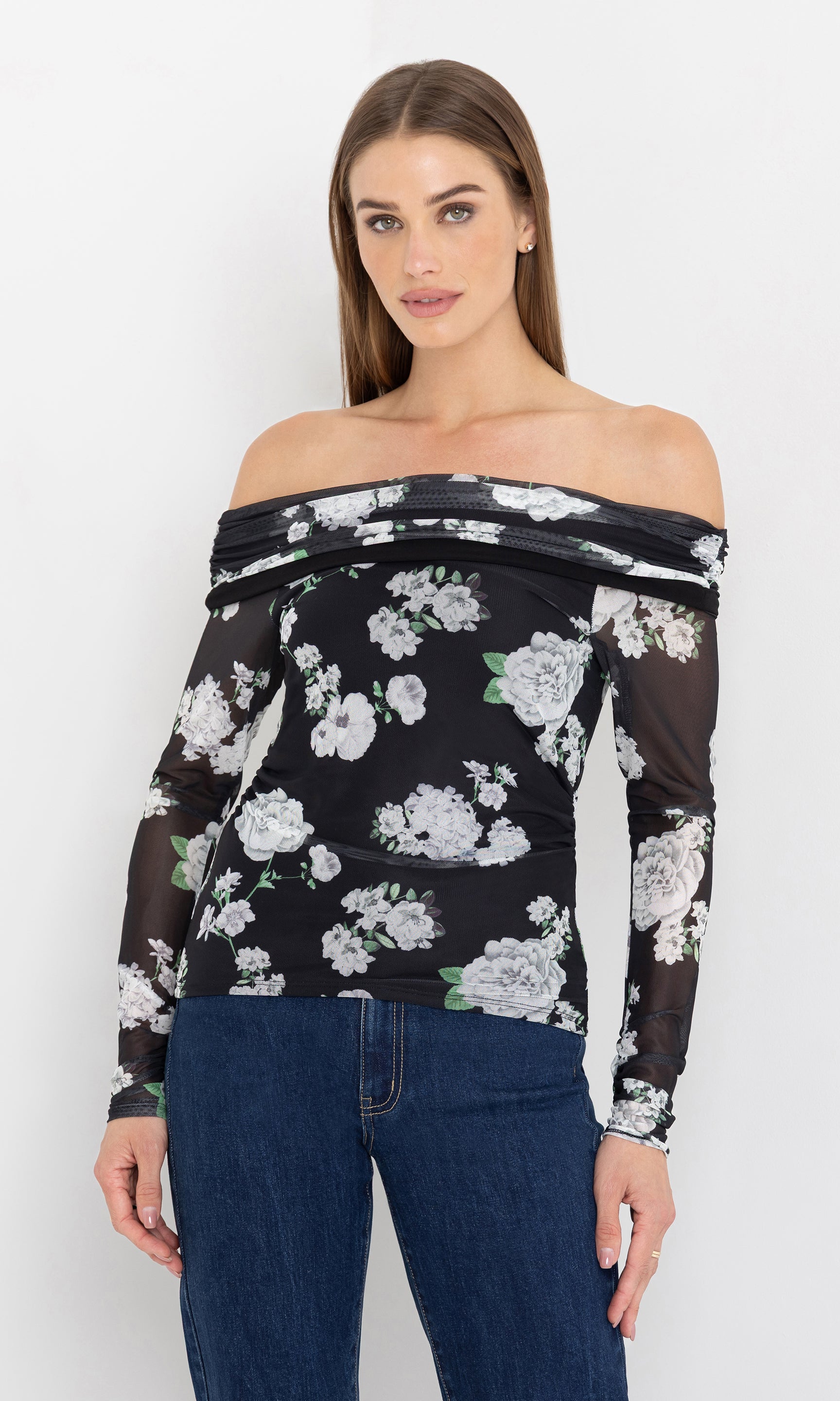 Three-quarter front view of the romeo floral mesh top emphasizing the slim fit.