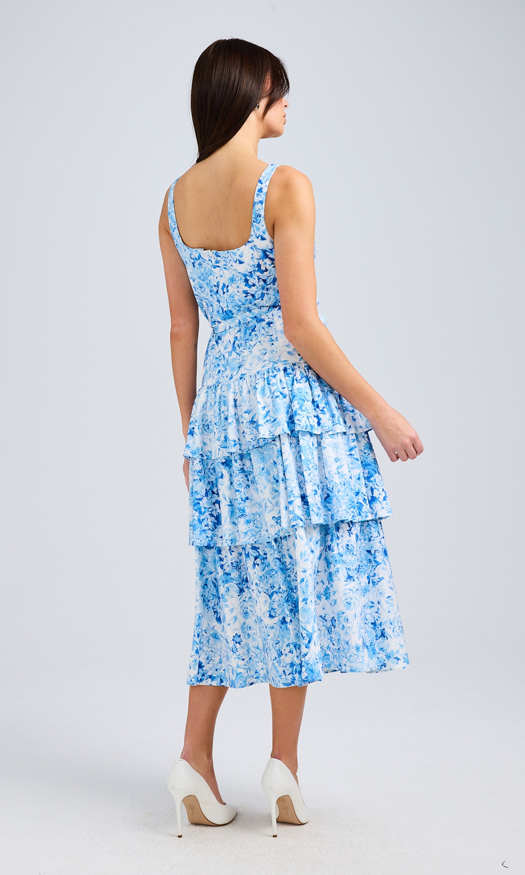 Rear View Of Model In A Blue Floral Midi Dress, Showcasing The Back Details